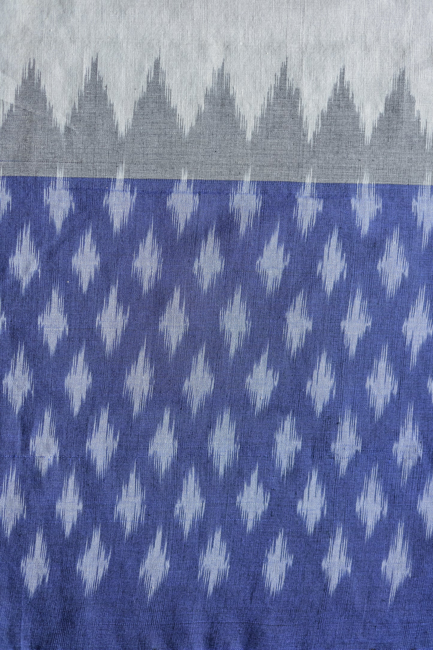 Off White Ikat Cotton with Big Blue Border Saree