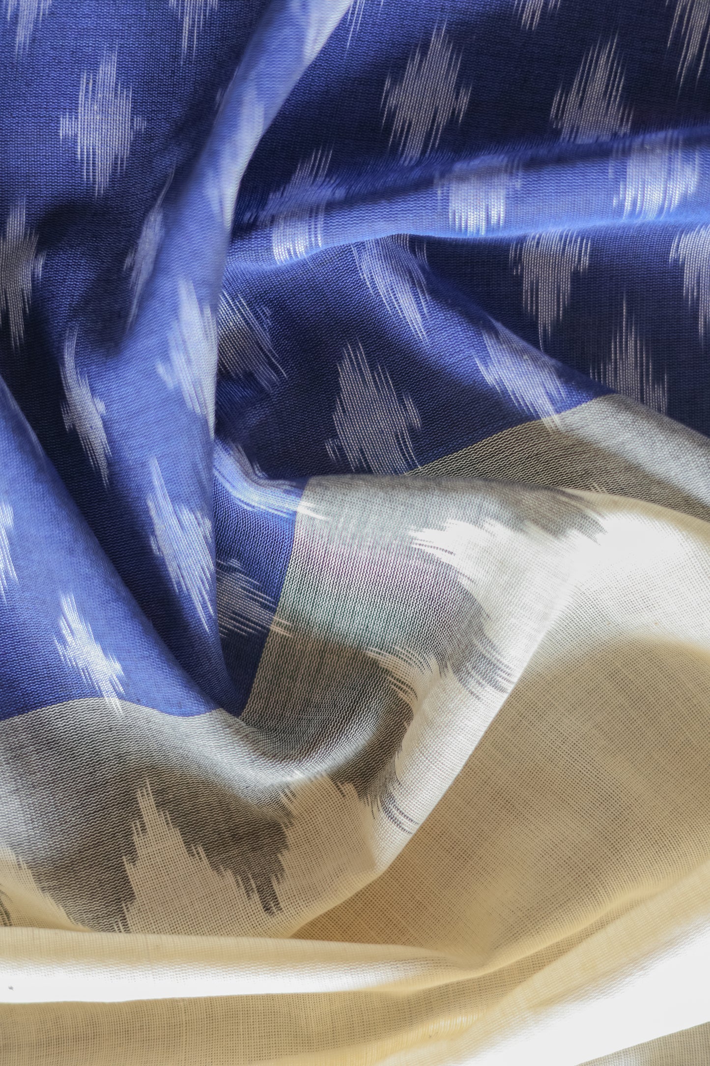 Off White Ikat Cotton with Big Blue Border Saree