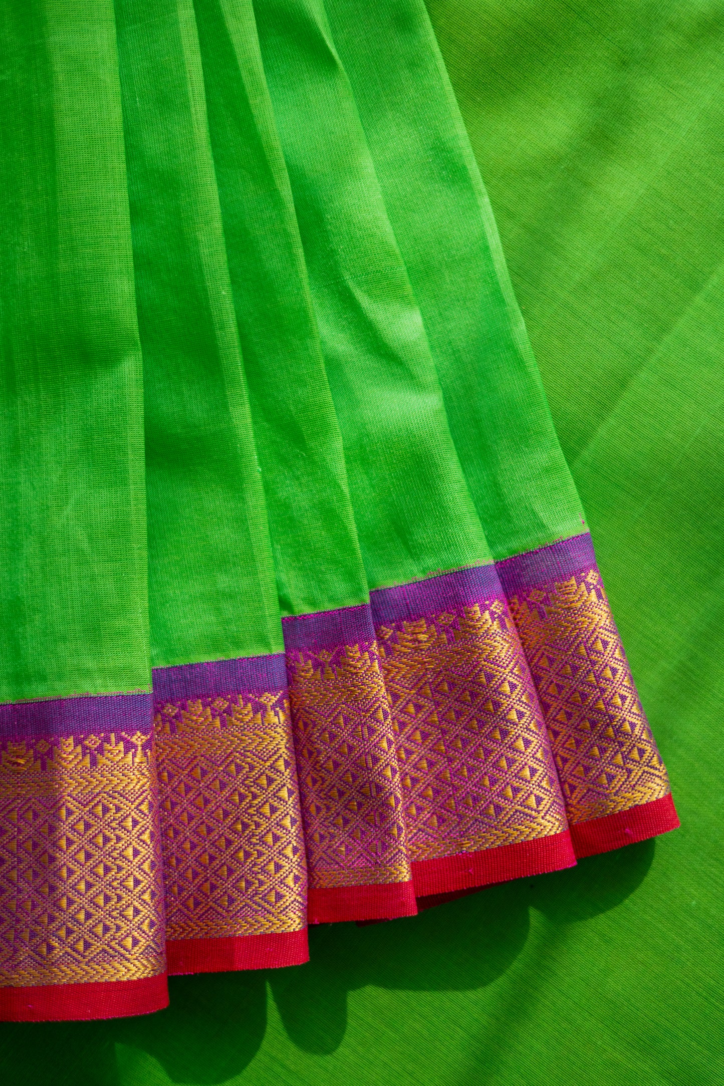 Green Silk Cotton with Traditional Purple Border Saree