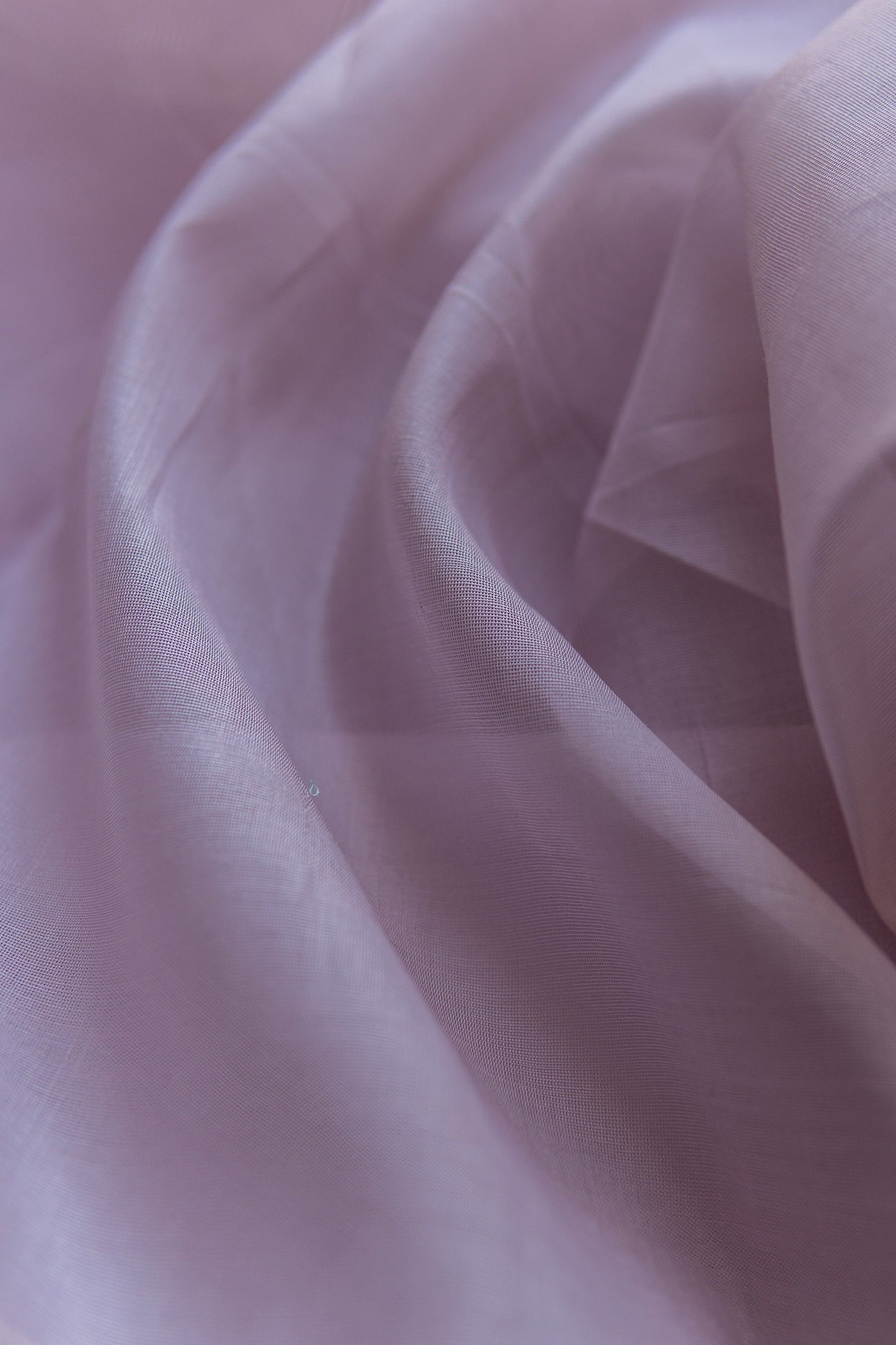 Lilac pink silk cotton saree with parrot border and pallu