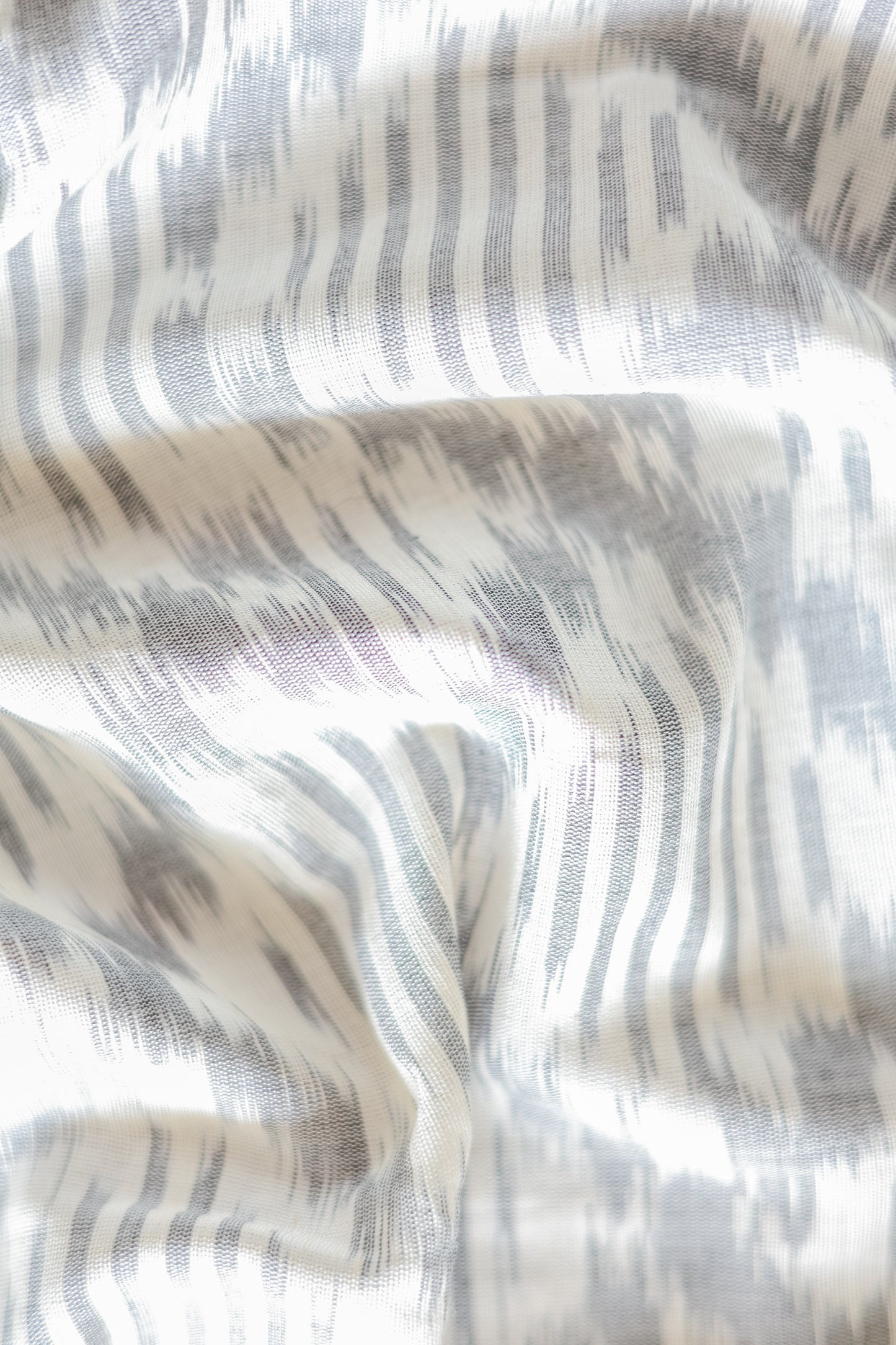 Off White Ikat Cotton with Small Black Border Saree