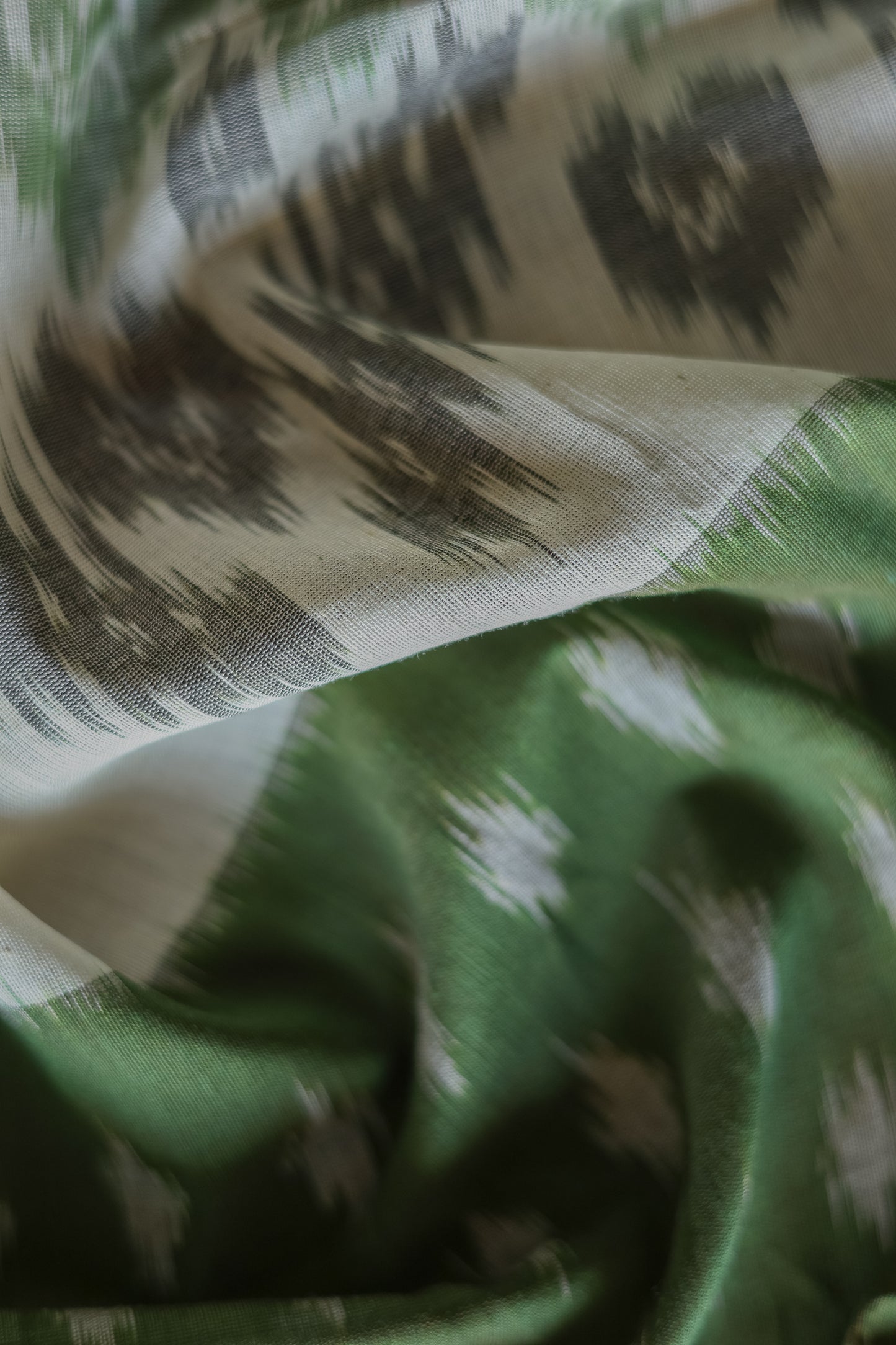 Off White Ikat Cotton with Black Border Saree