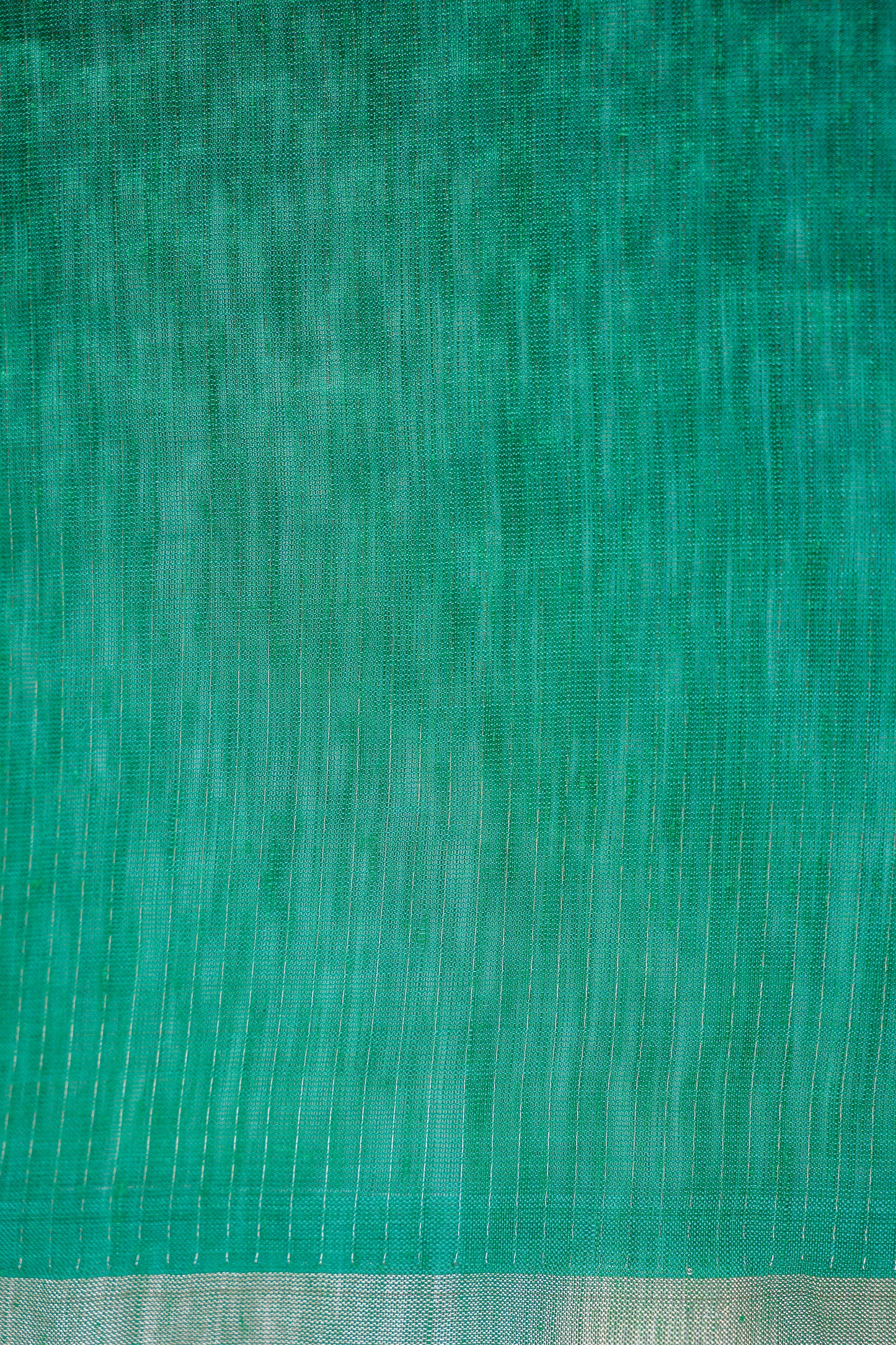 Emerald Green Linen by Silk Saree with Silver Zari Border