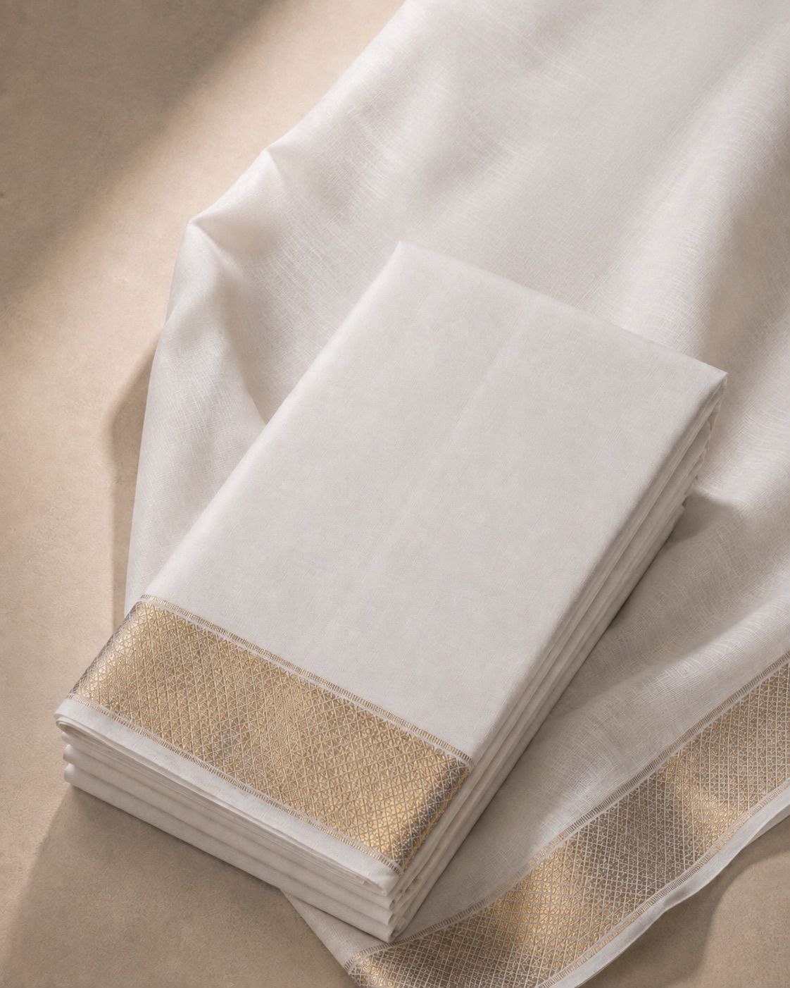 White Veshti with Gold Zari Kan Pettu Border