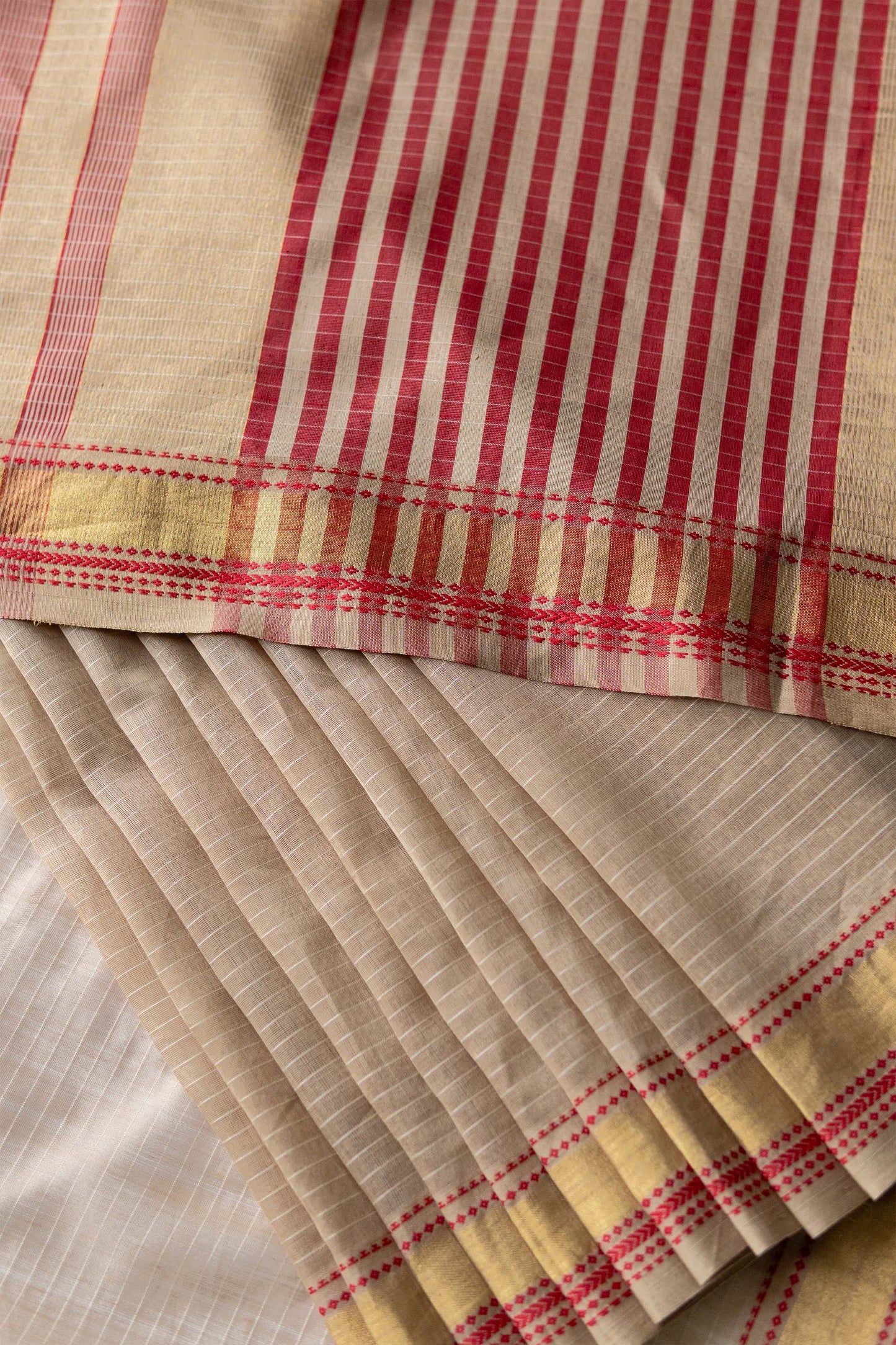 Light brown striped body with Multi colour border silk cotton saree