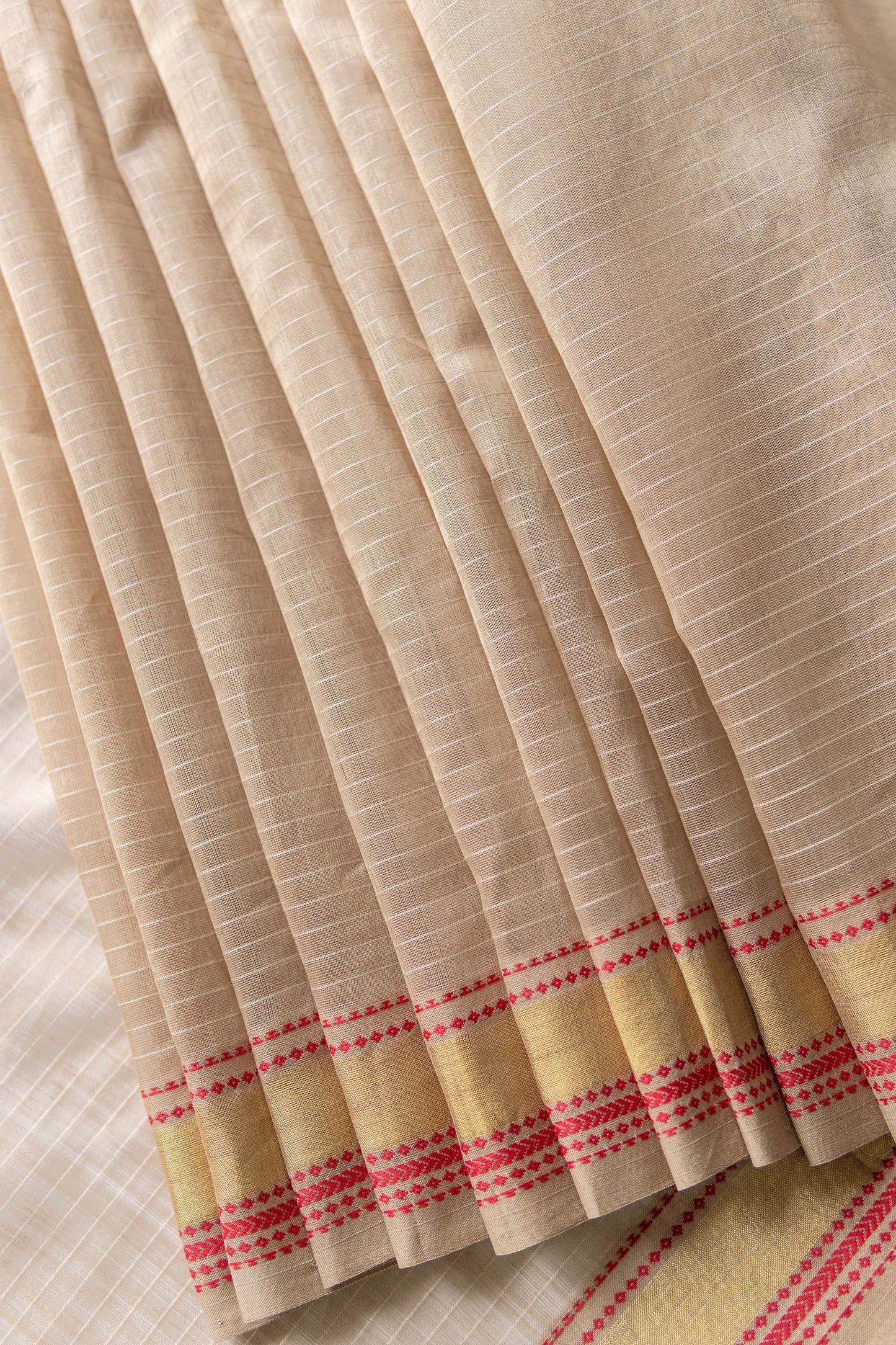 Light brown striped body with Multi colour border silk cotton saree