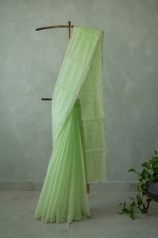 Pista Green Silk Cotton Plain Body with Silver Motif Saree