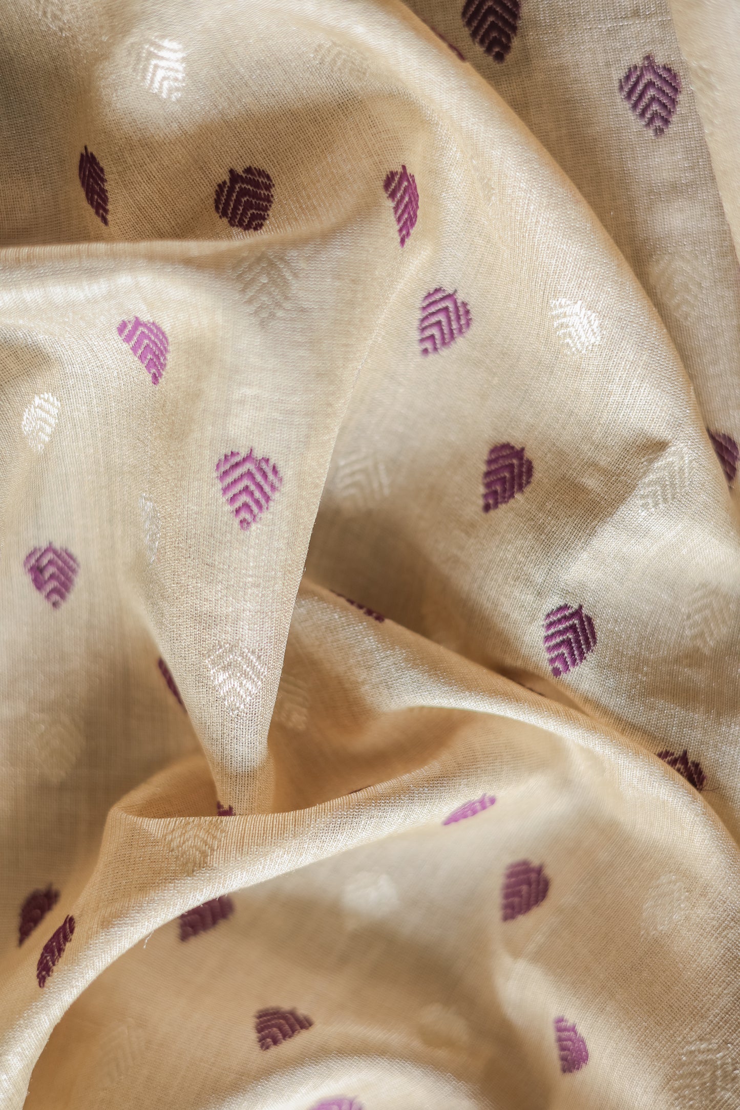 Beige Tussar Moonga Tissue with Purple and White Leaf Motif Saree