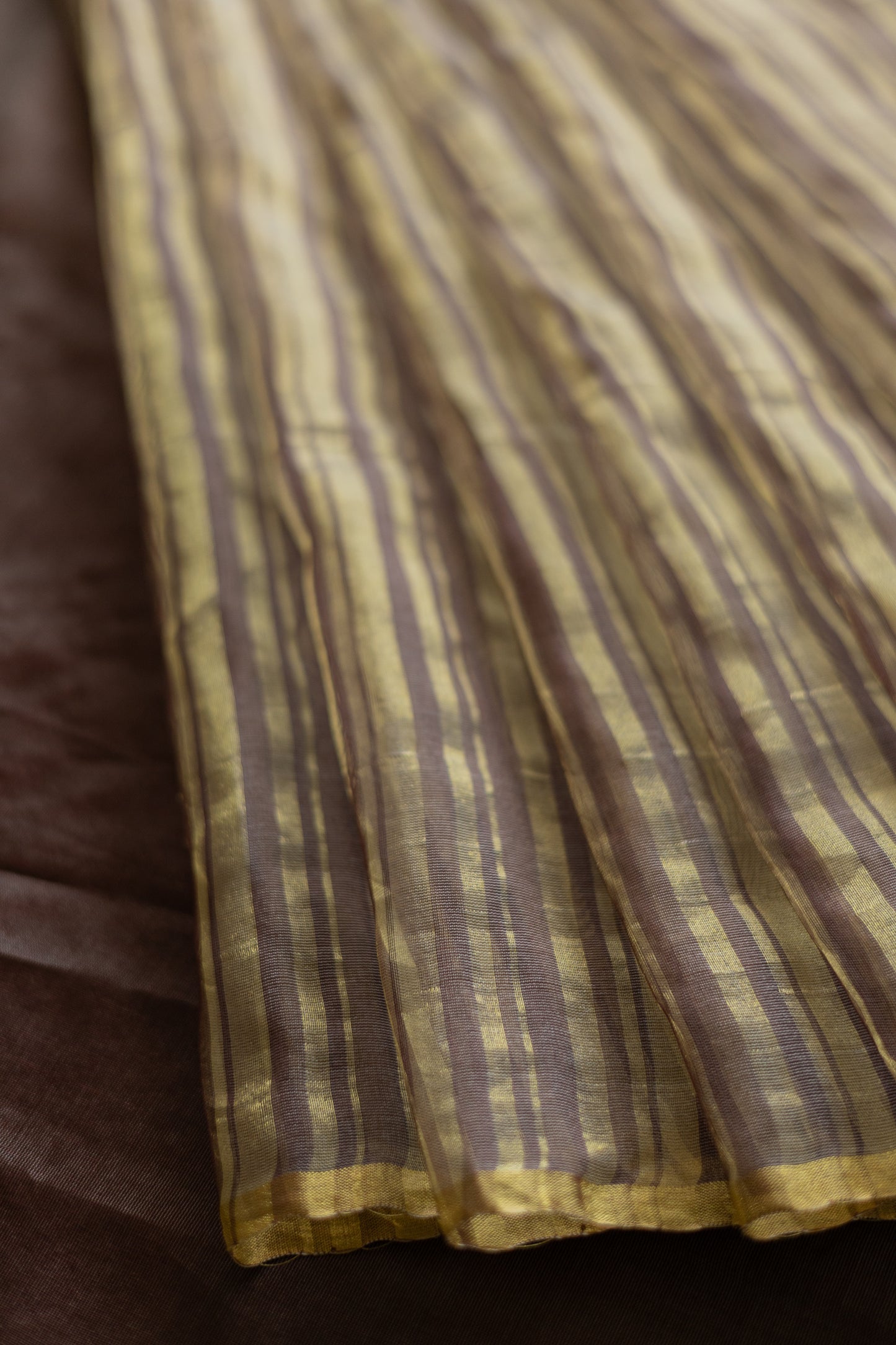 Brown and Gold Silk Cotton All Over Gold Tissue Random Striped Saree