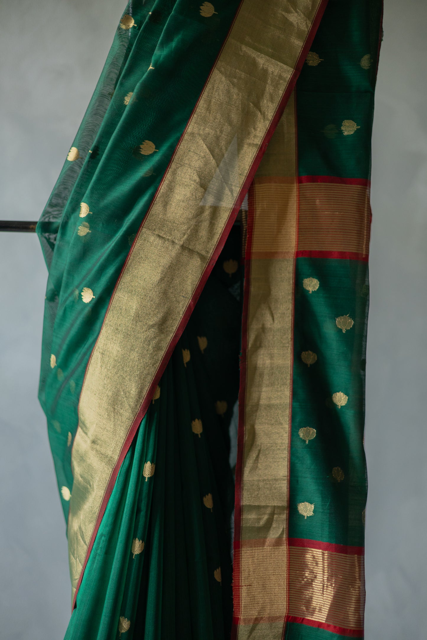 Green Chanderi Silk Cotton with Gold Lotus Motif and Thin Red Border Saree