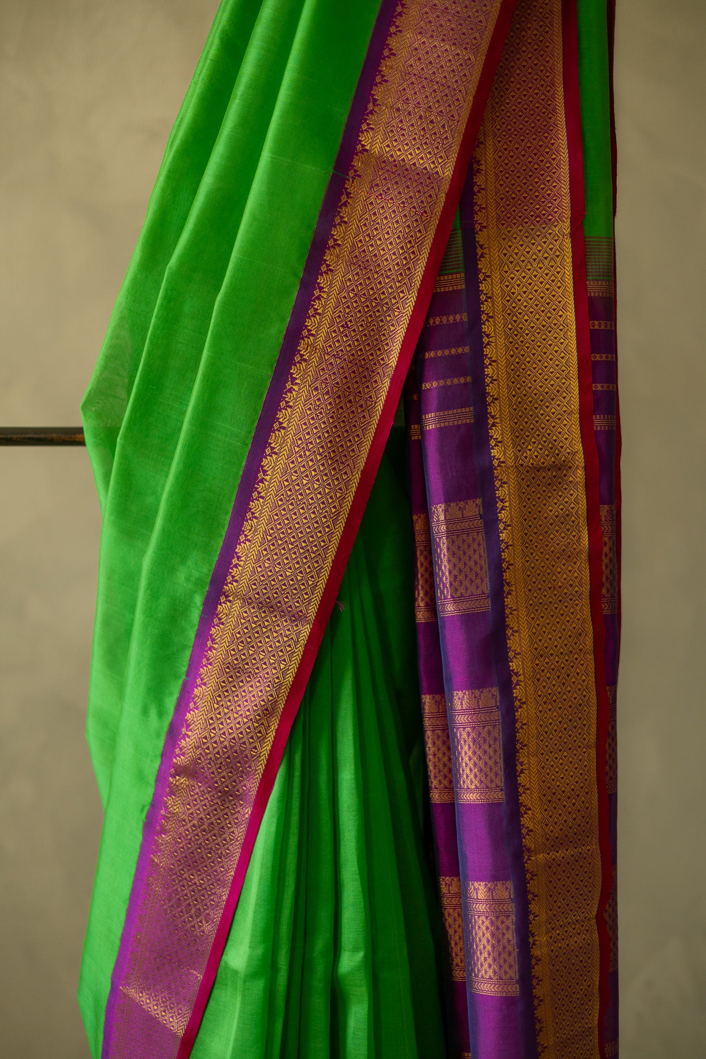 Green Silk Cotton with Traditional Purple Border Saree