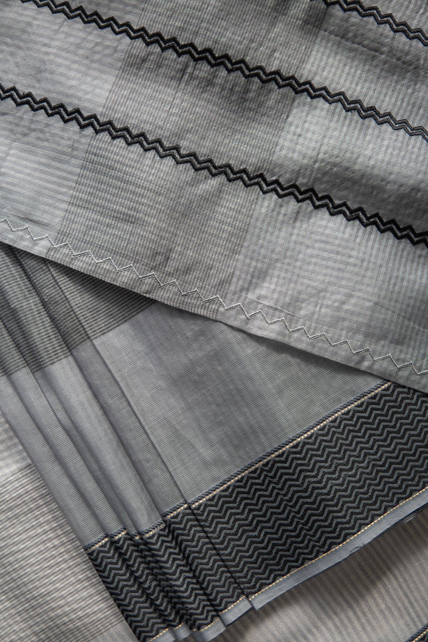 Dark Grey Silk Mercerised Cotton with Multi Checked Body and Zig Zag Border Saree