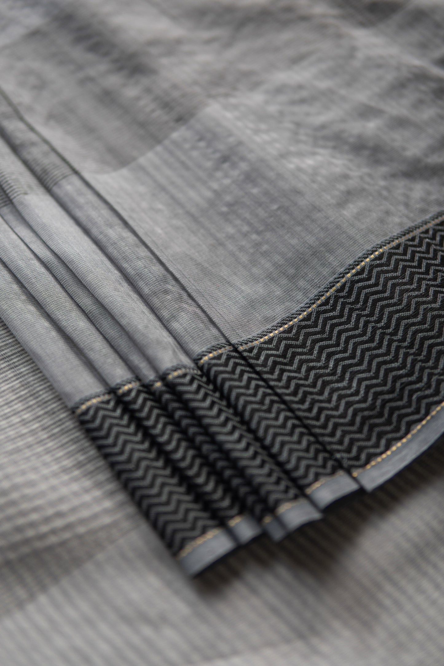 Dark Grey Silk Mercerised Cotton with Multi Checked Body and Zig Zag Border Saree