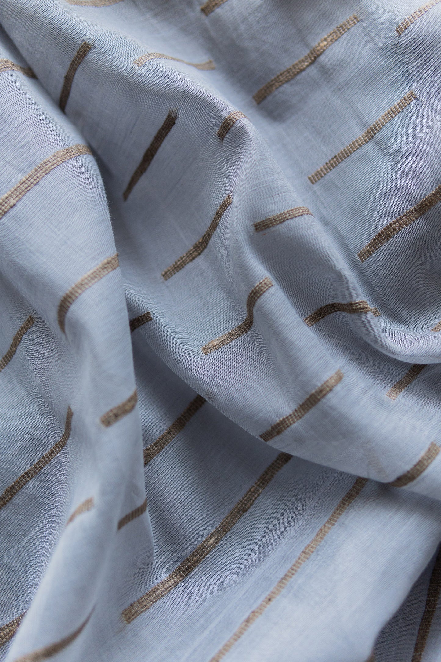 Powder Blue Tussar Khadi with Random Khapa Striped Saree