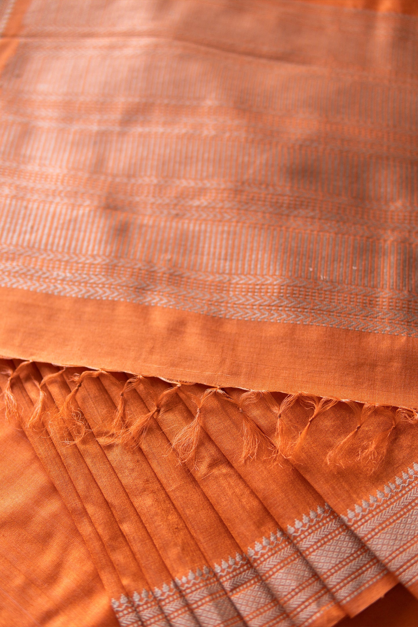 Orange Tussar Silk Plain Body with Moonga Doddy Border Saree