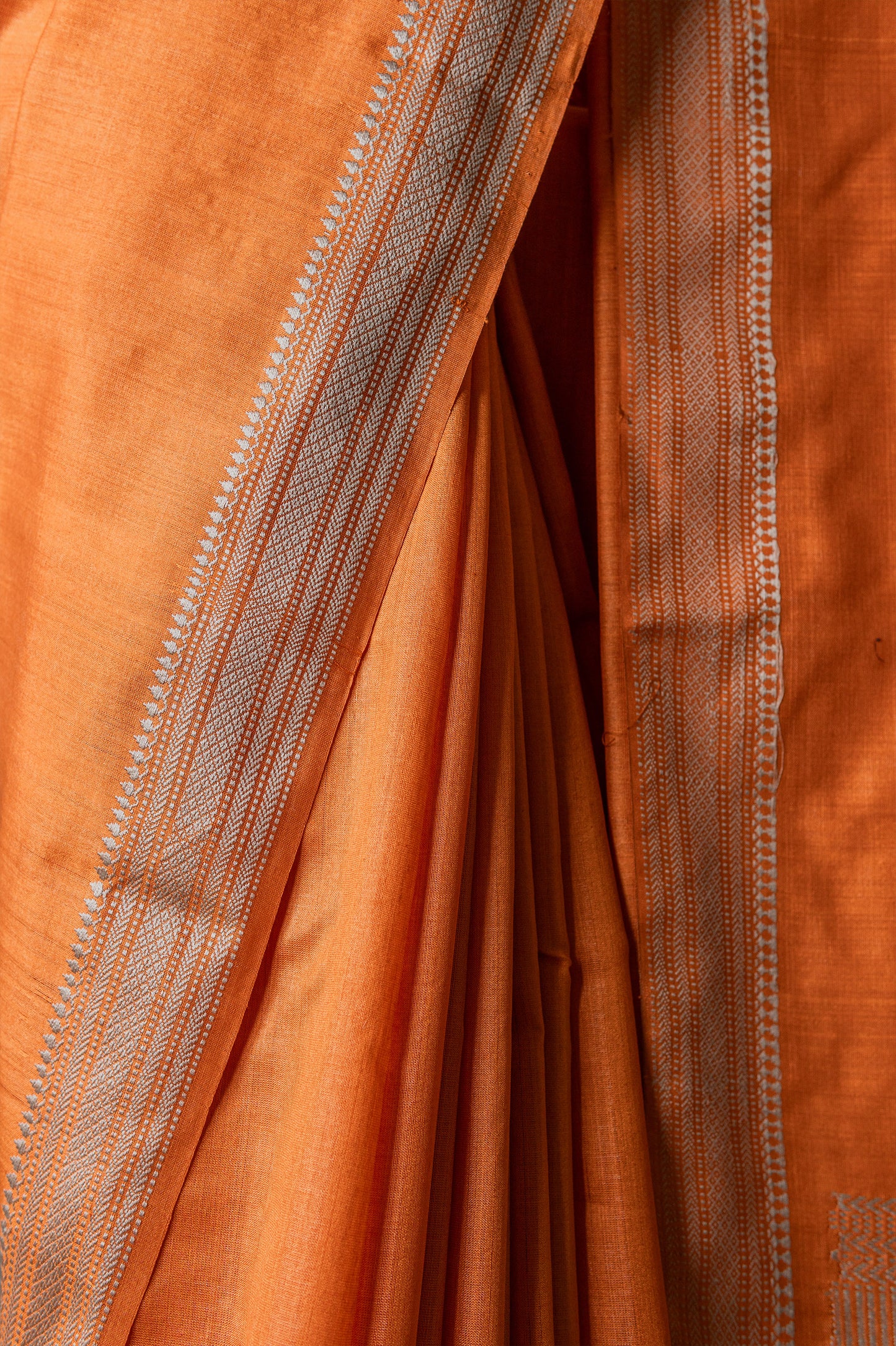 Orange Tussar Silk Plain Body with Moonga Doddy Border Saree