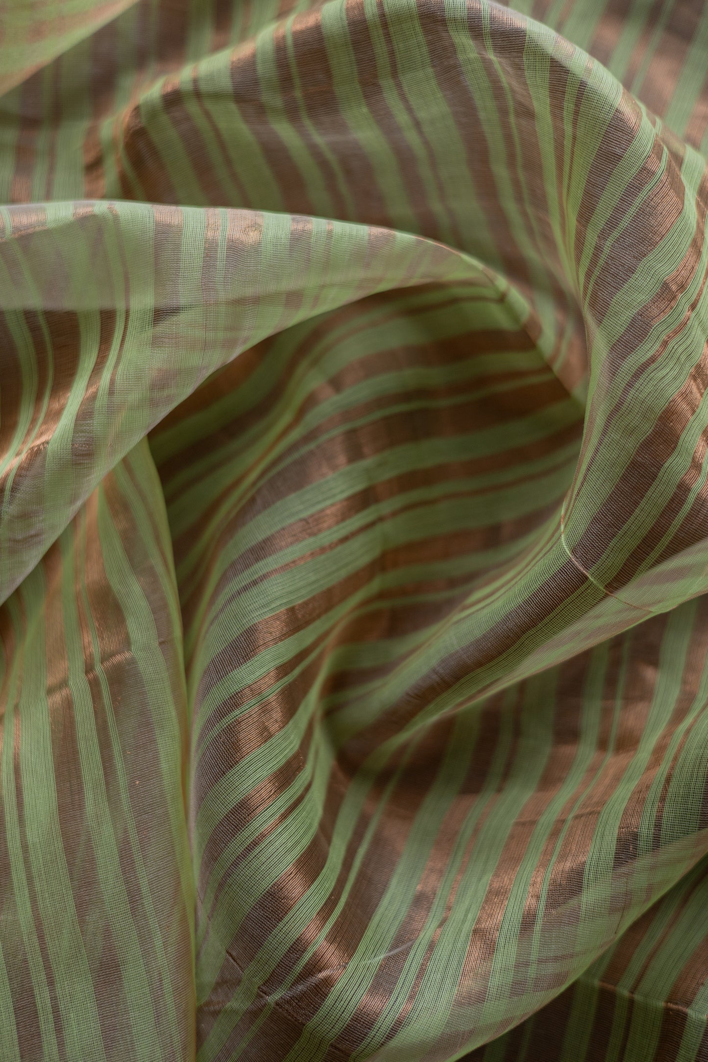 Pista Green and Copper Silk Cotton All Over Gold Tissue Random Striped Saree