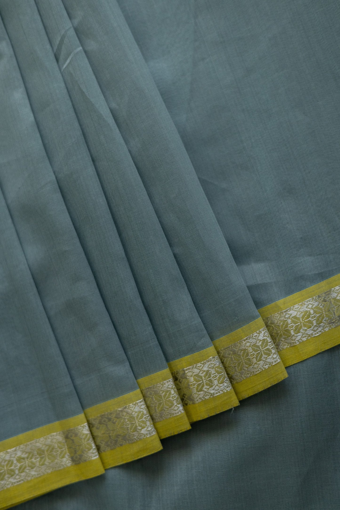 Powder Blue Maheswari Checks Body Zigzag Border Saree