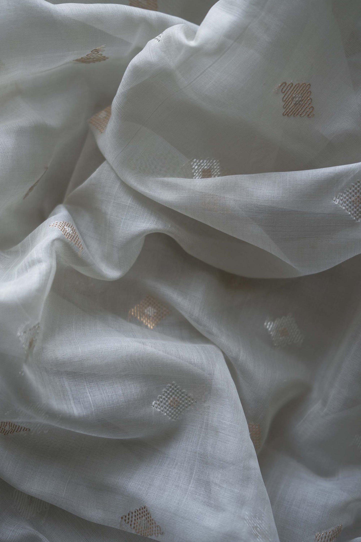 Grey silk with mercerised cotton and all over meena diamond motif saree