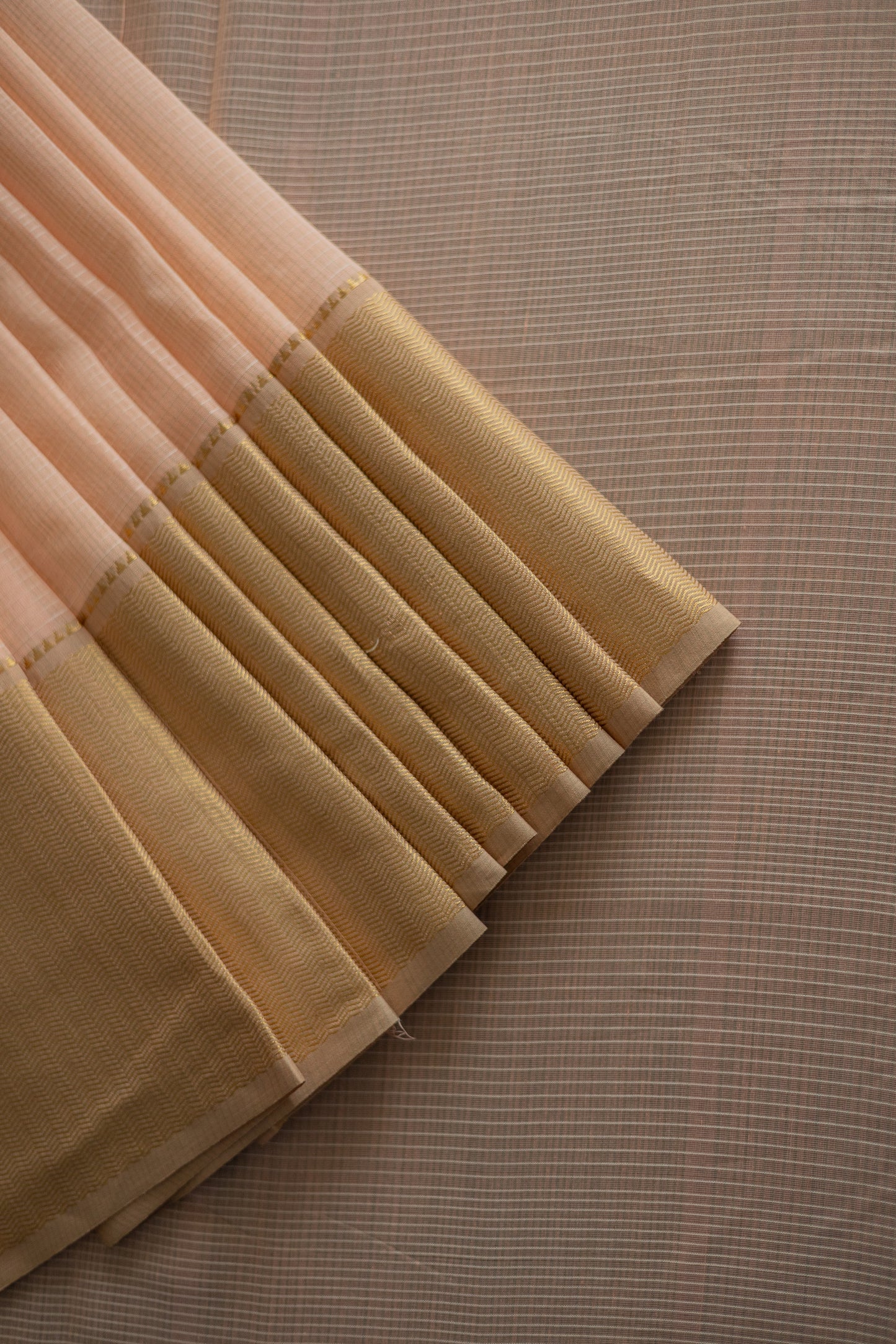 Peach Maheswari Checked Body zigzag border saree