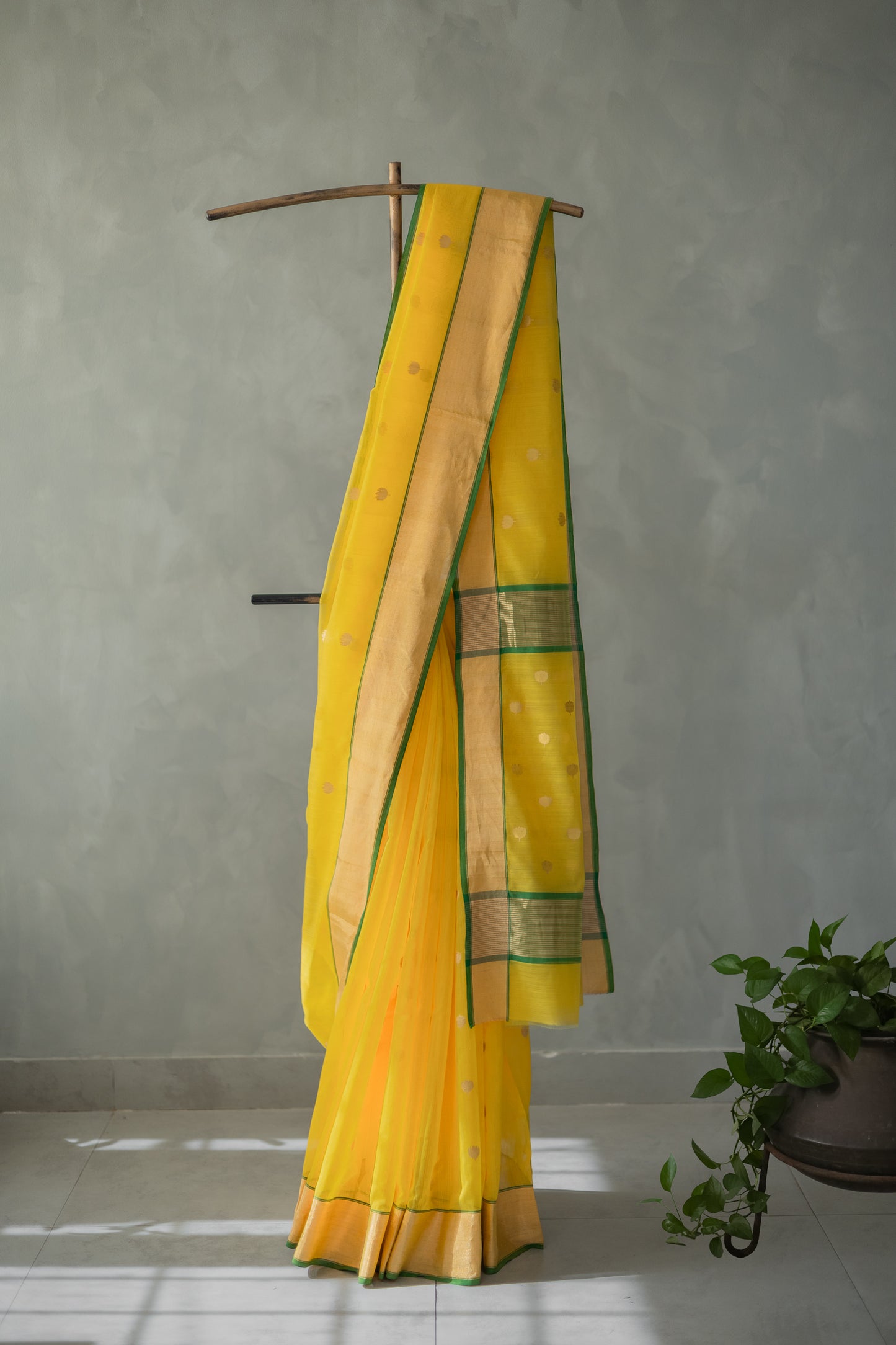 Yellow Chanderi Silk with Gold and Green Border and Lotus Motif Saree