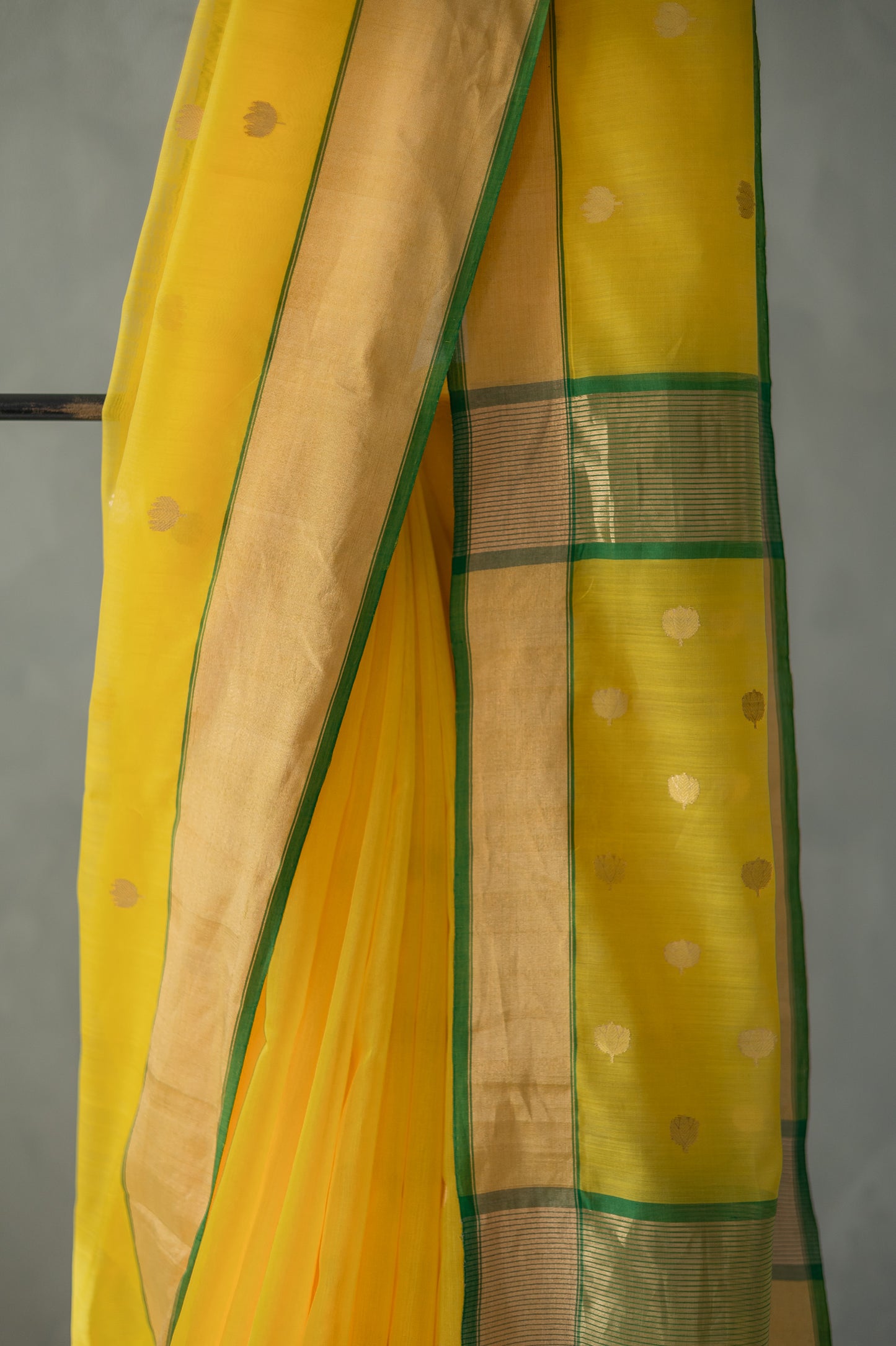 Yellow Chanderi Silk with Gold and Green Border and Lotus Motif Saree