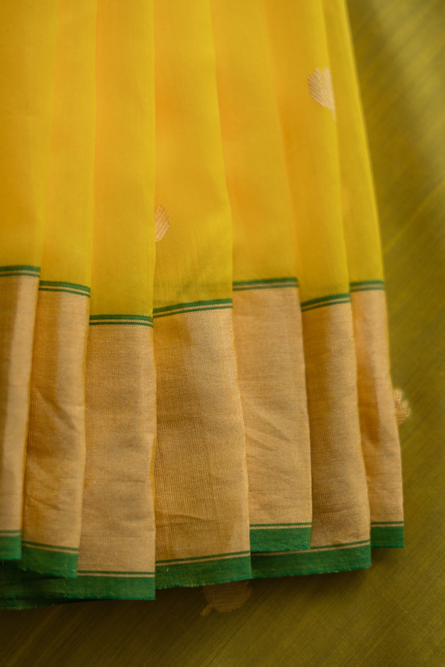 Yellow Chanderi Silk with Gold and Green Border and Lotus Motif Saree