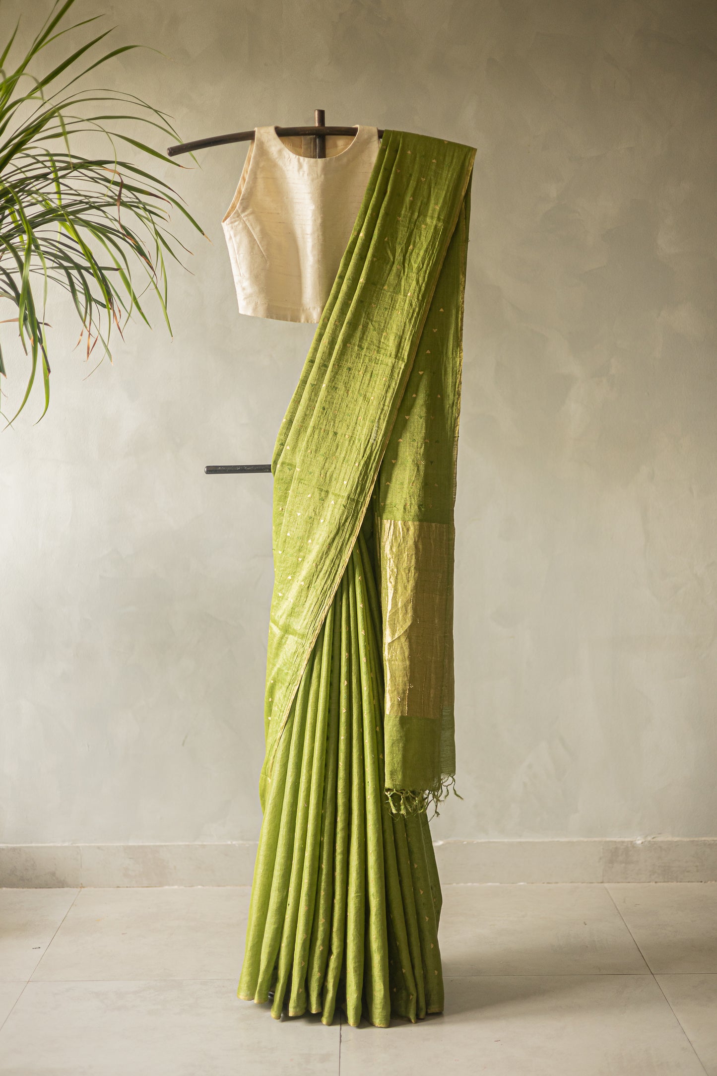 Parrot Green Tussar with Green and Gold Triangle Woven Motif Saree