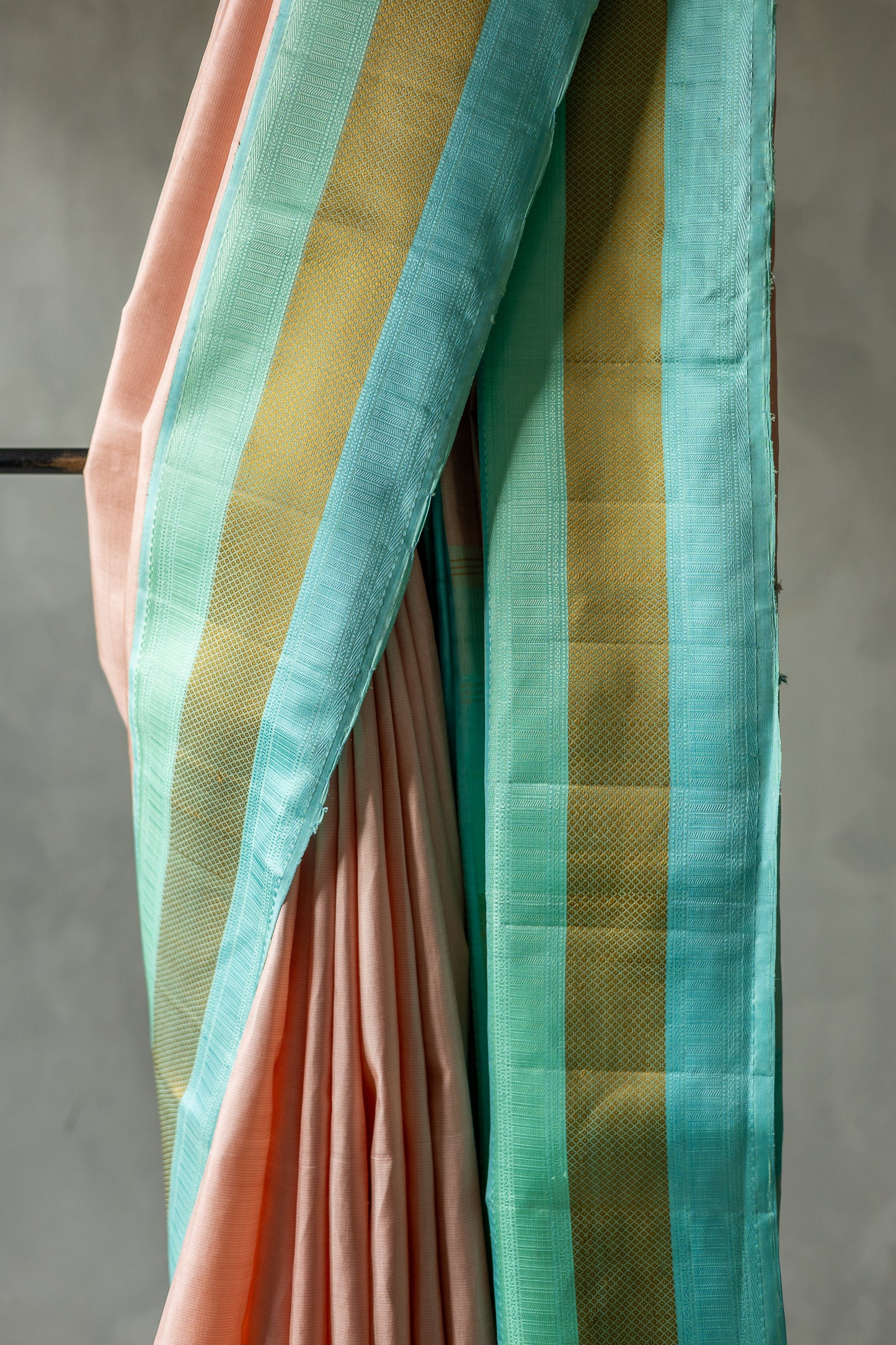 Peach Kanjivaram Silk with Turqoise Border and Pallu Saree