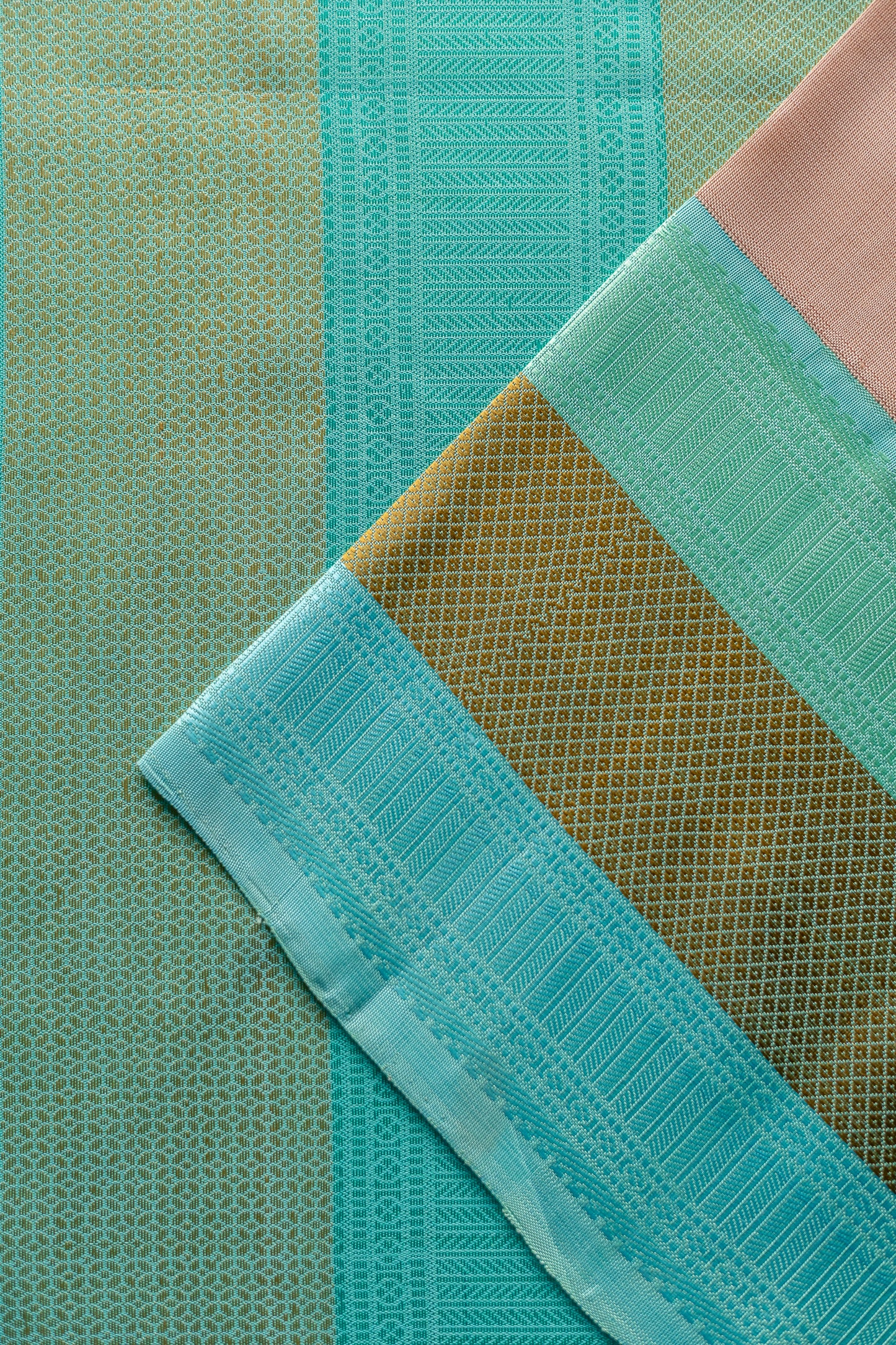 Peach Kanjivaram Silk with Turqoise Border and Pallu Saree