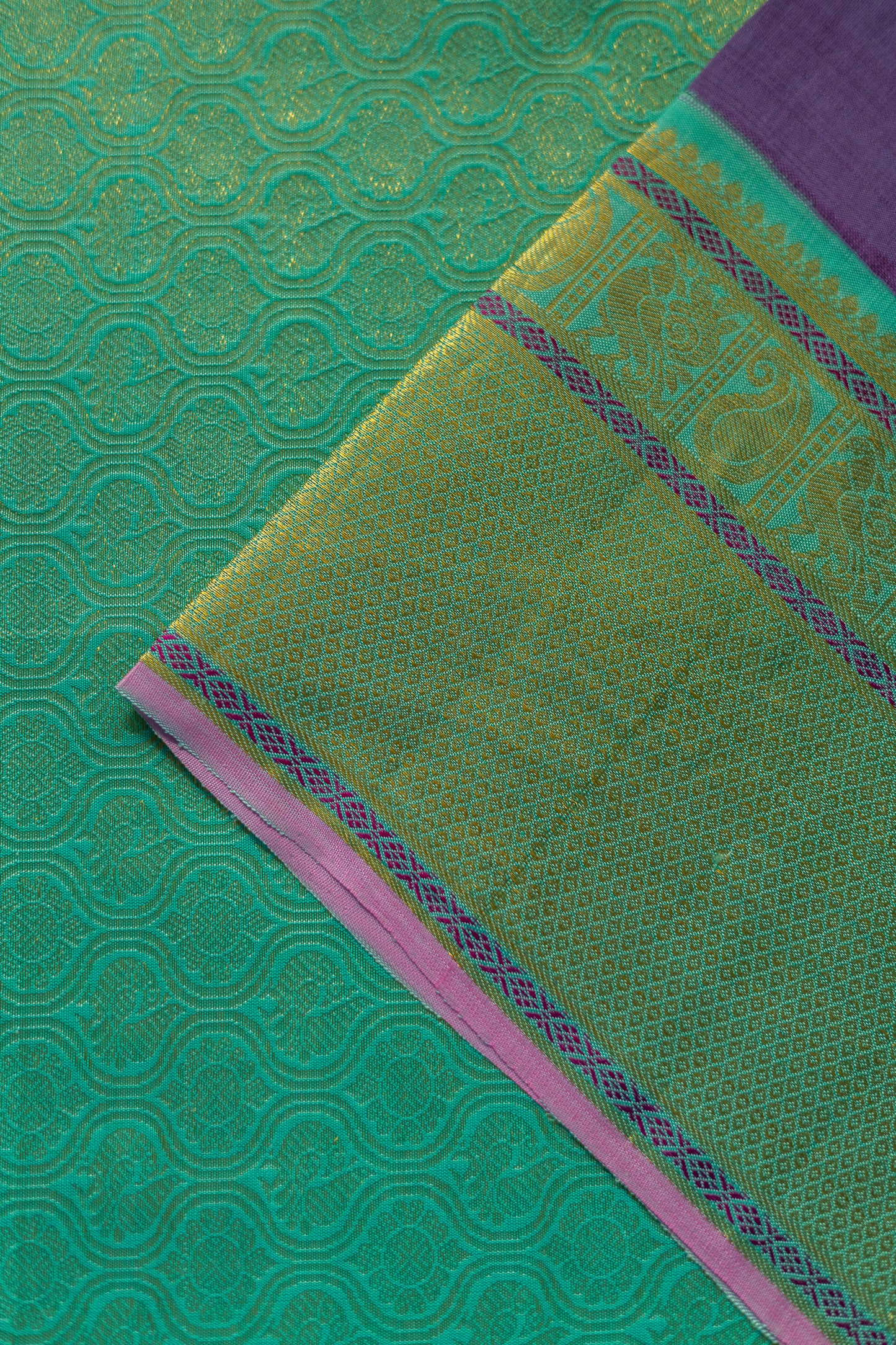 Purple Kanjivaram Silk with Small Round Zari motif and Green Border Saree