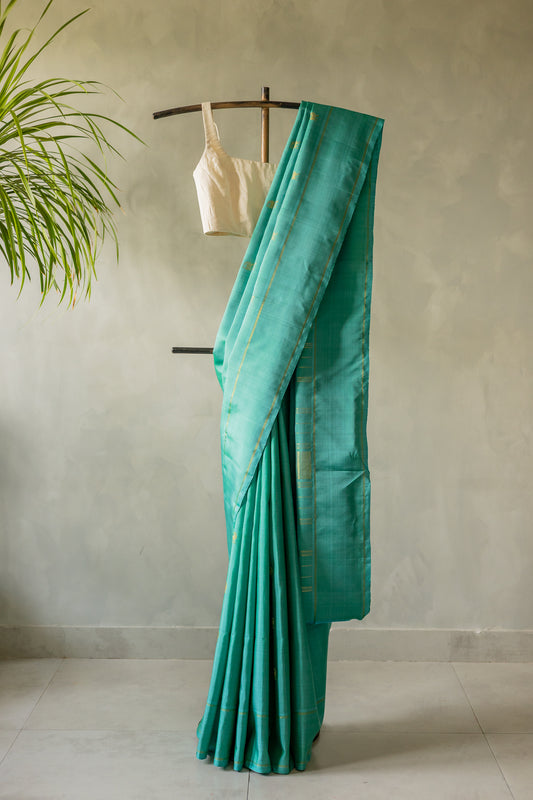Teal Kanjivaram Silk with Intricately Woven Yazhi Motifs Saree