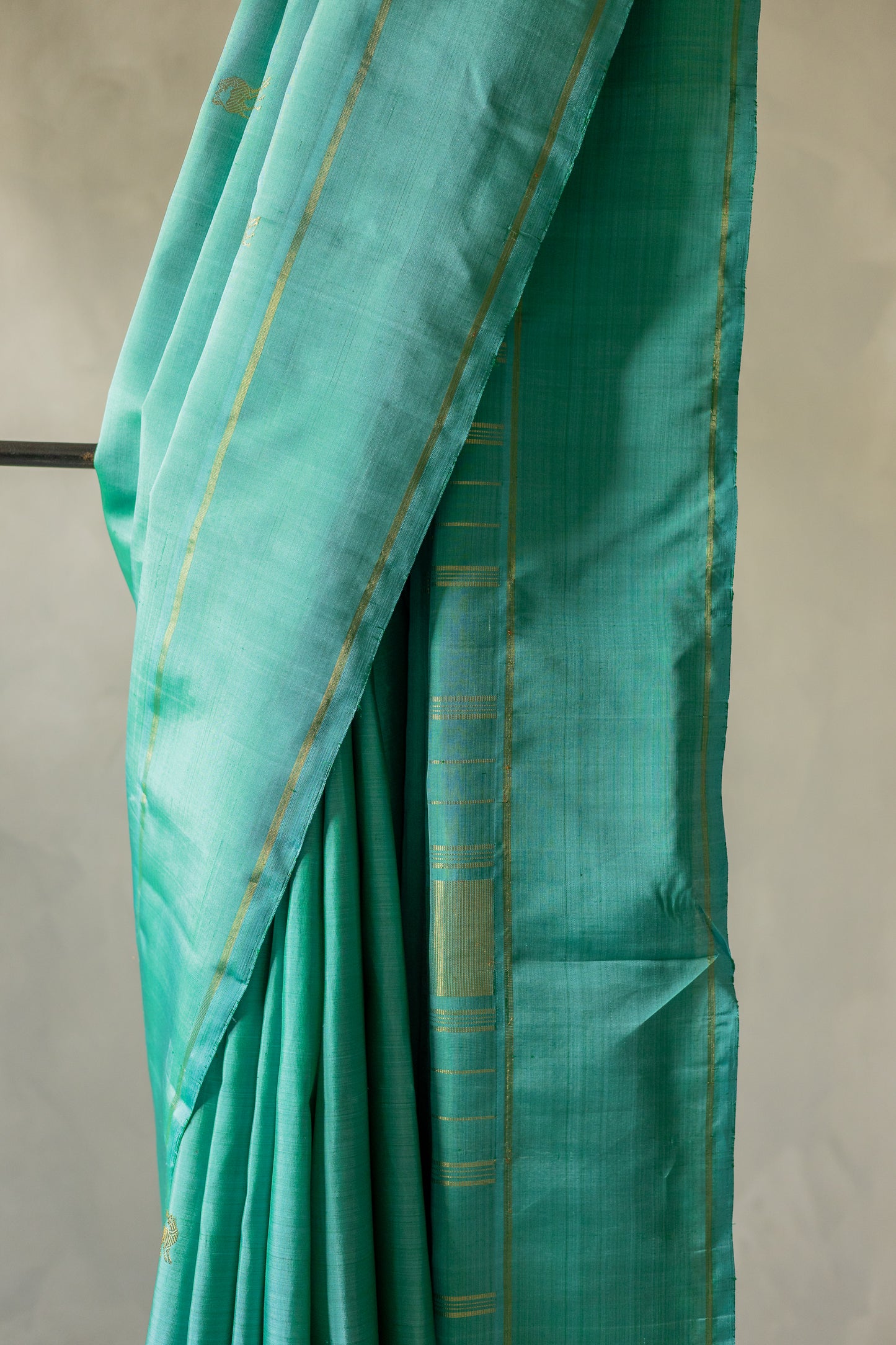 Teal Kanjivaram Silk with Intricately Woven Yazhi Motifs Saree