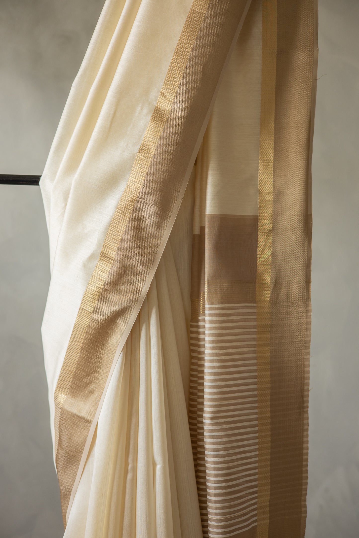 Off White with Beige  Border and Striped pallu saree