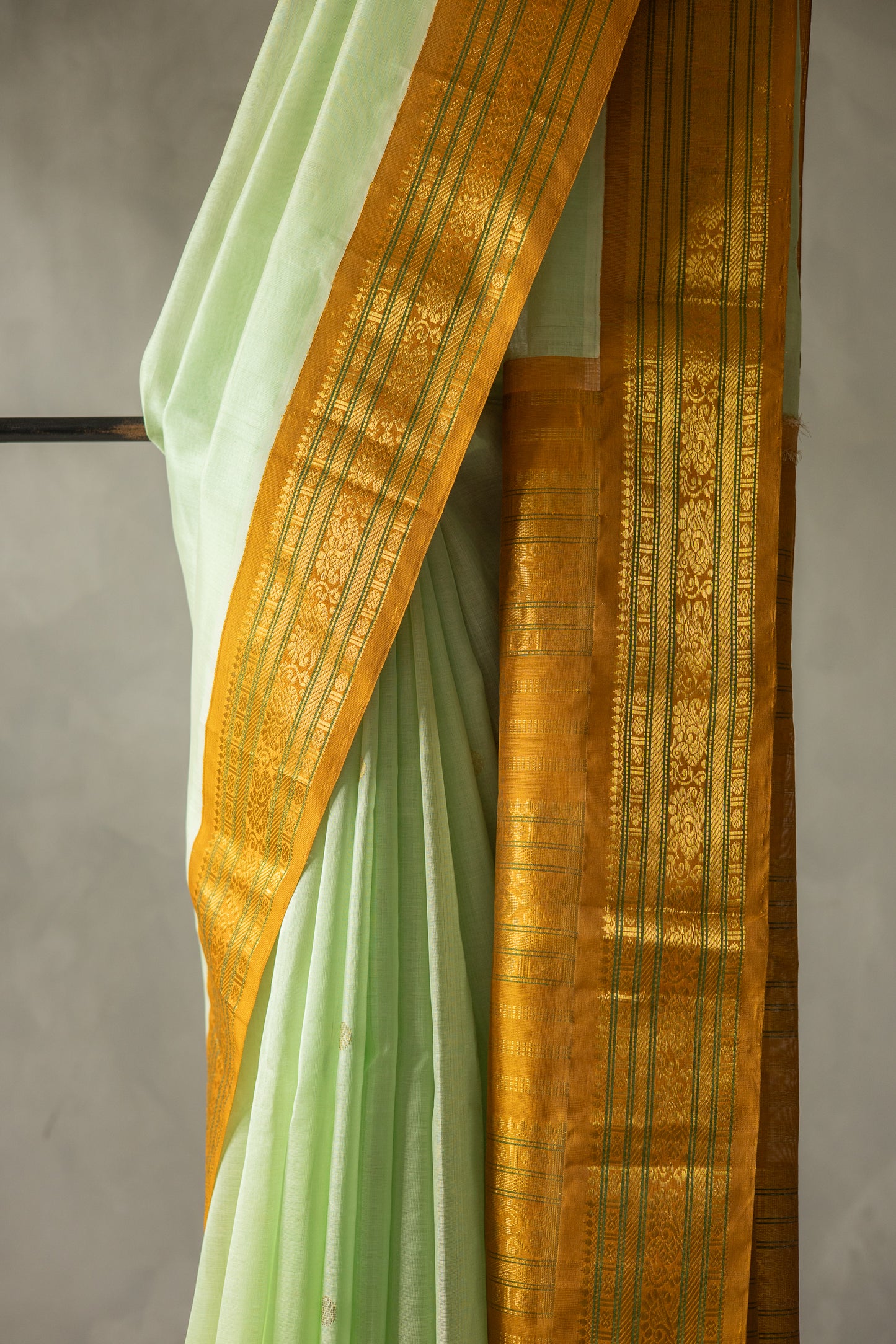 Pista Green Silk Cotton with Gold Motif and Traditional Border Saree