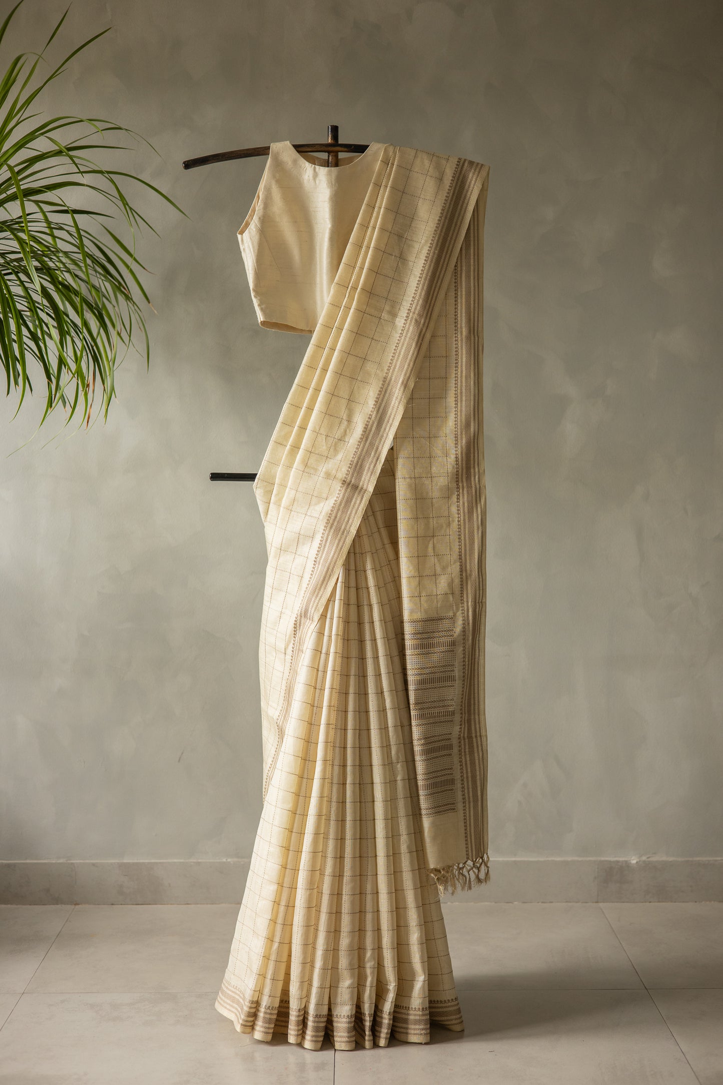 Beige Tussar Muga with Brown Checks Woven Saree