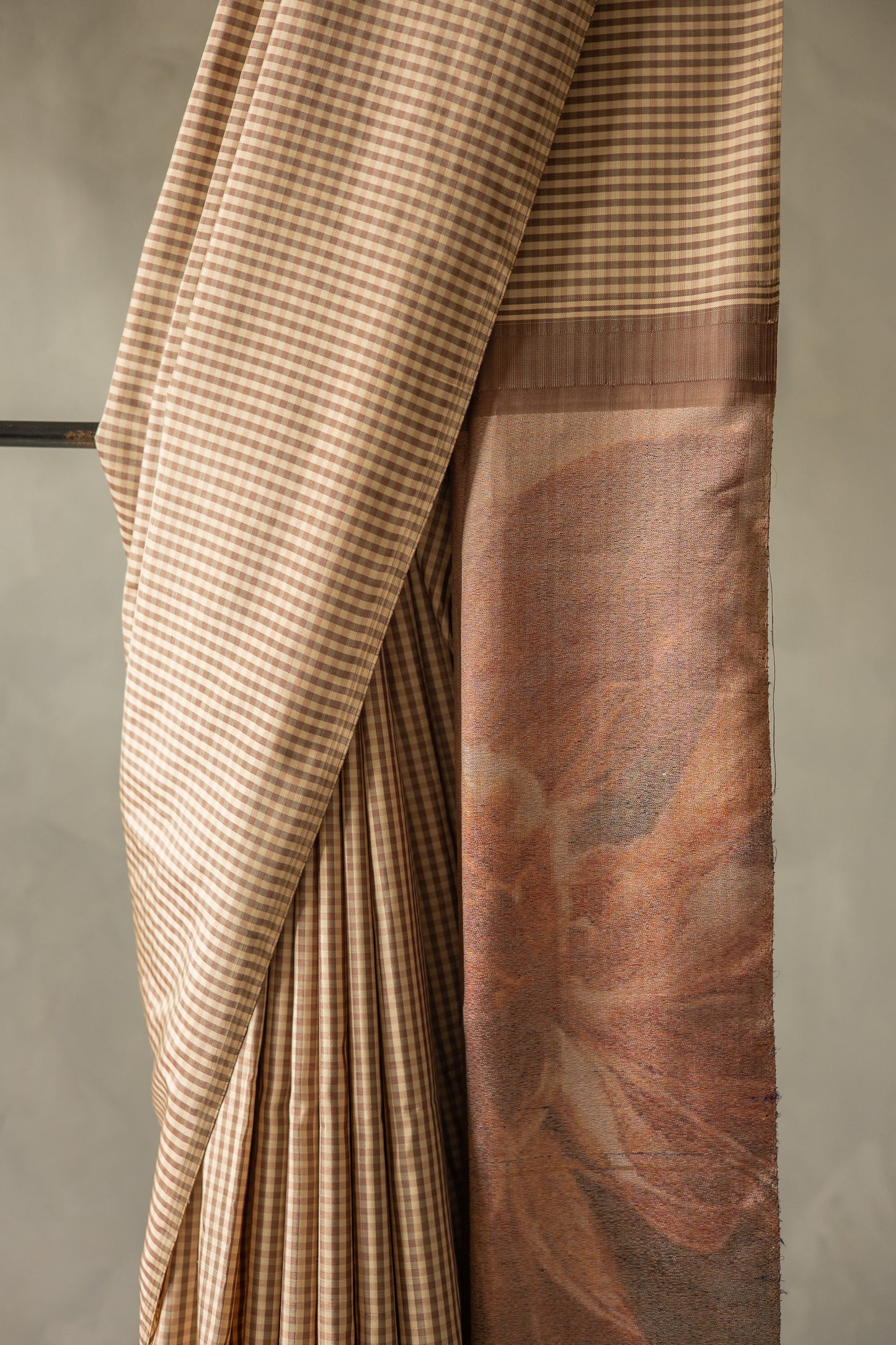 Traditional Brown and White All Over Small Checks with a contemporary Twill weave flower design Pallu Kanjivaram Silk Saree