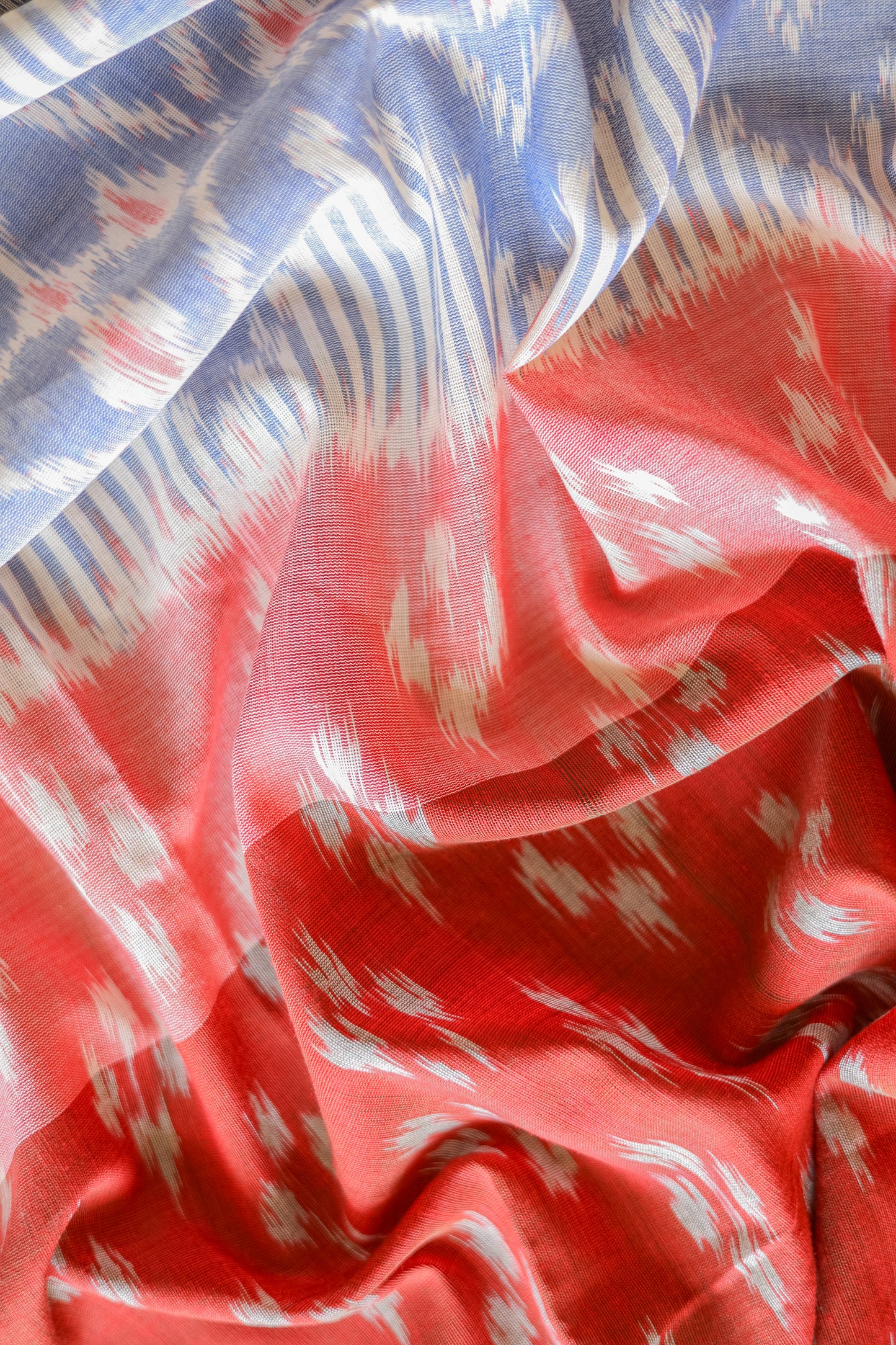 Orange and Blue Ikat Cotton with Blue Border Saree