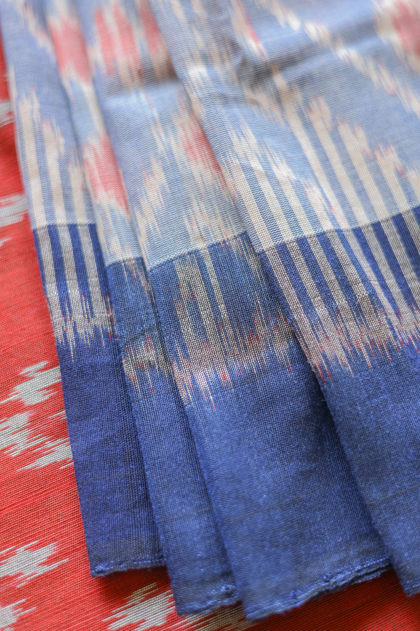 Orange and Blue Ikat Cotton with Blue Border Saree
