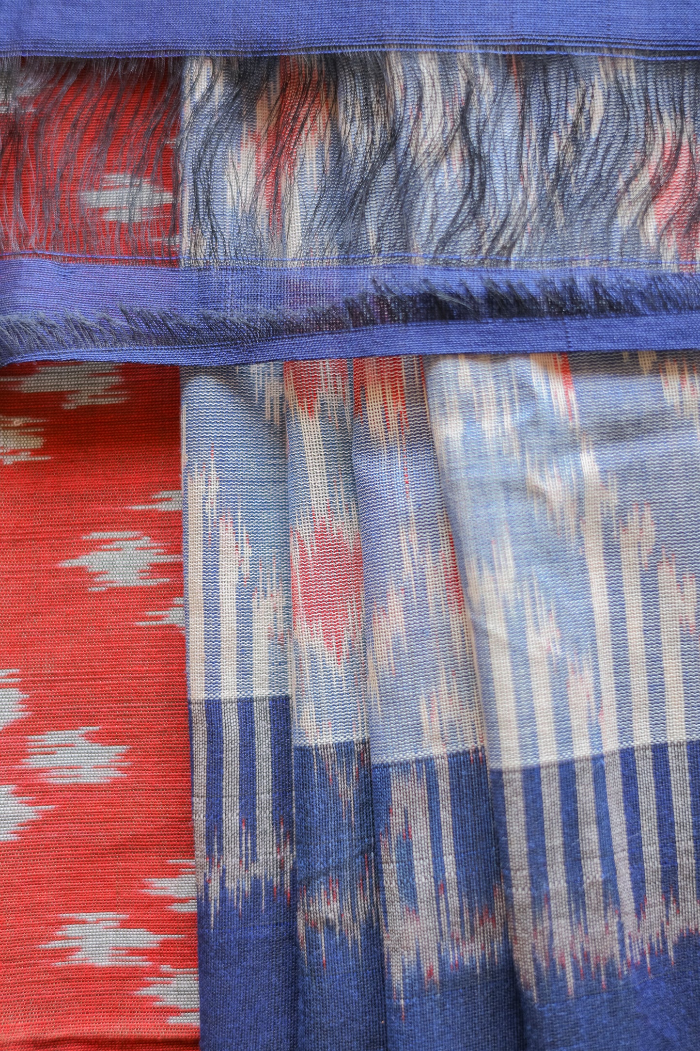 Orange and Blue Ikat Cotton with Blue Border Saree