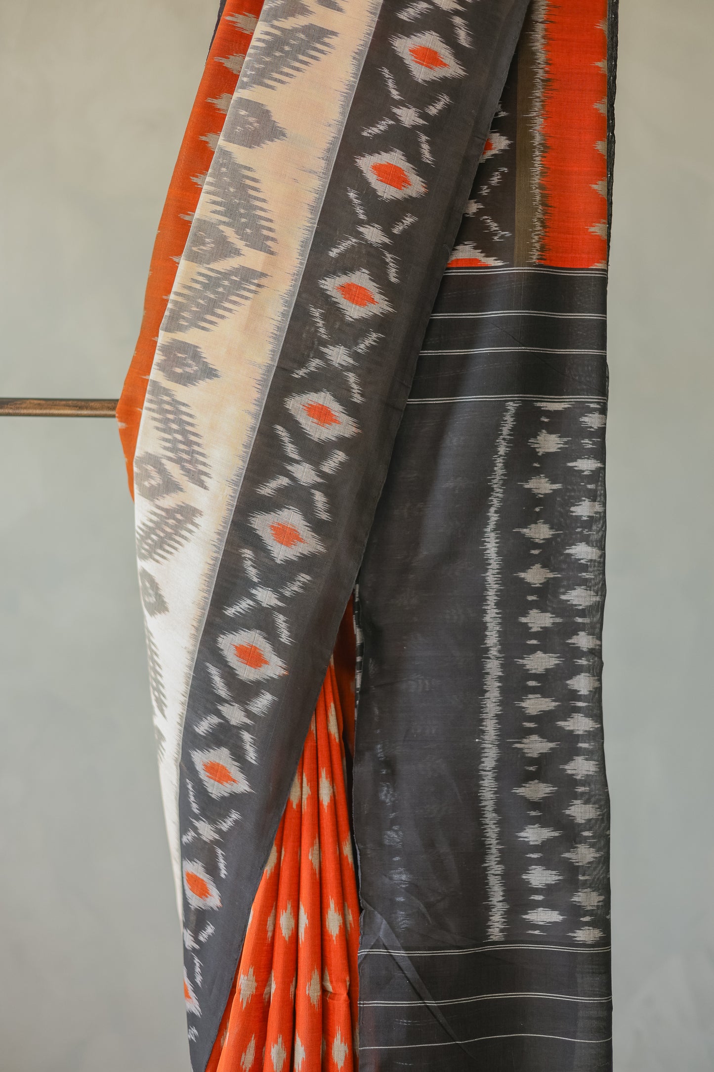 Orange and White Ikat Cotton with Black Border Saree