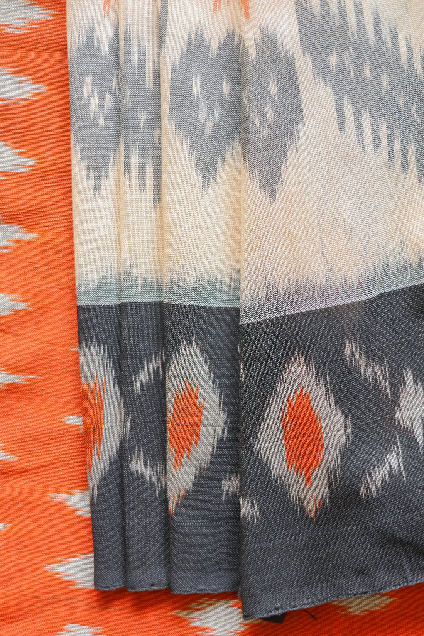 Orange and White Ikat Cotton with Black Border Saree