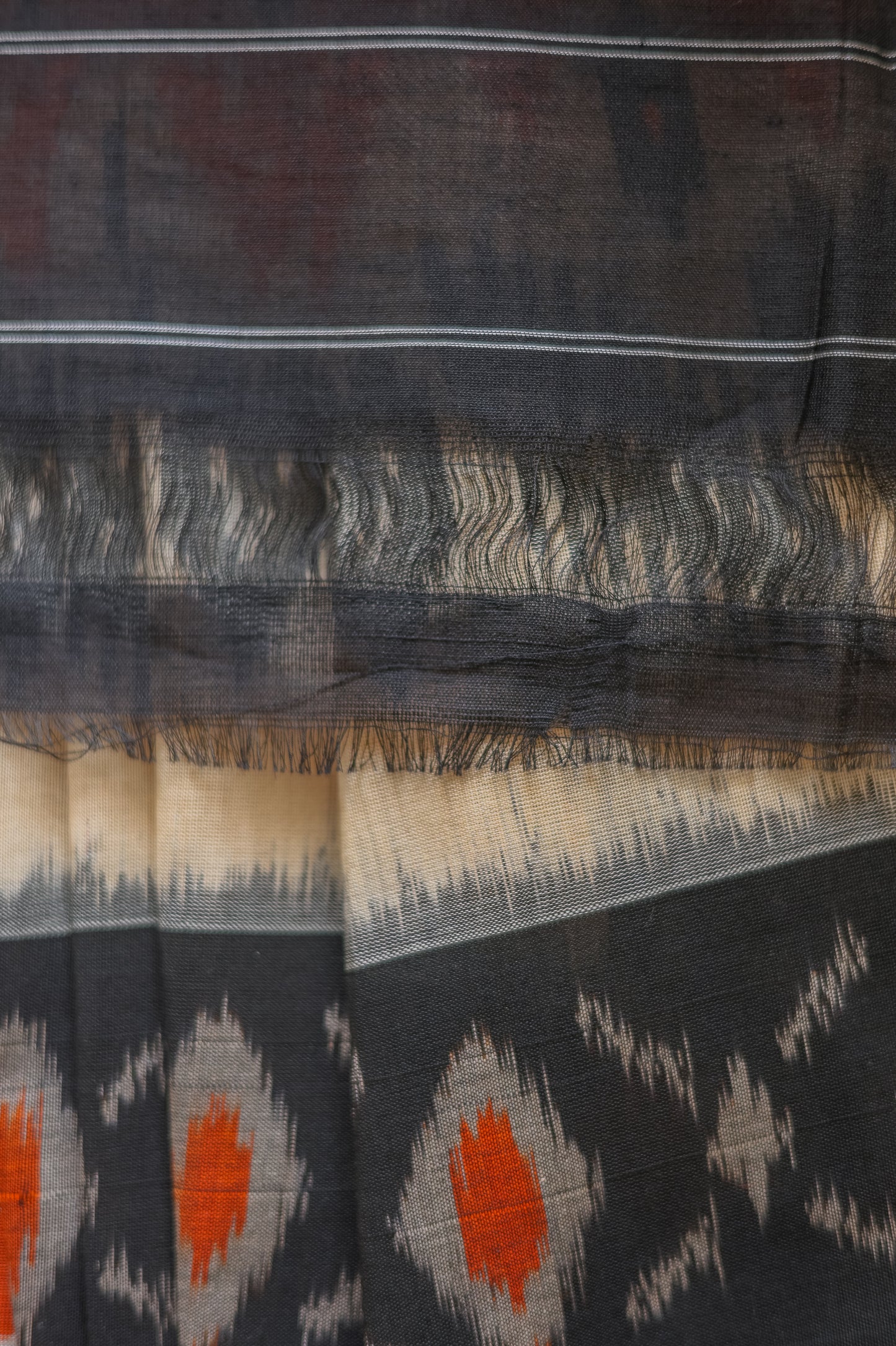 Orange and White Ikat Cotton with Black Border Saree