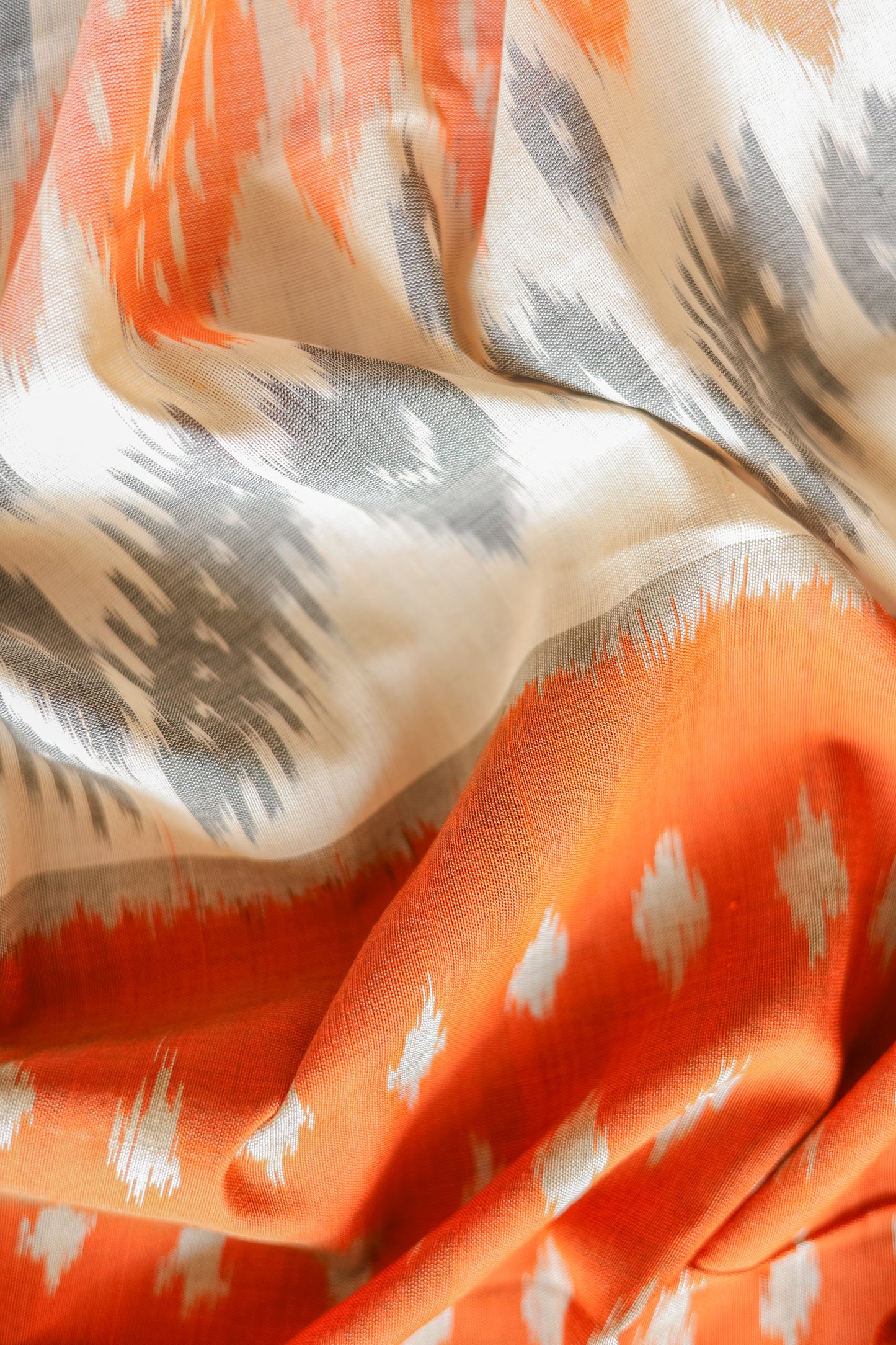 Orange and White Ikat Cotton with Black Border Saree