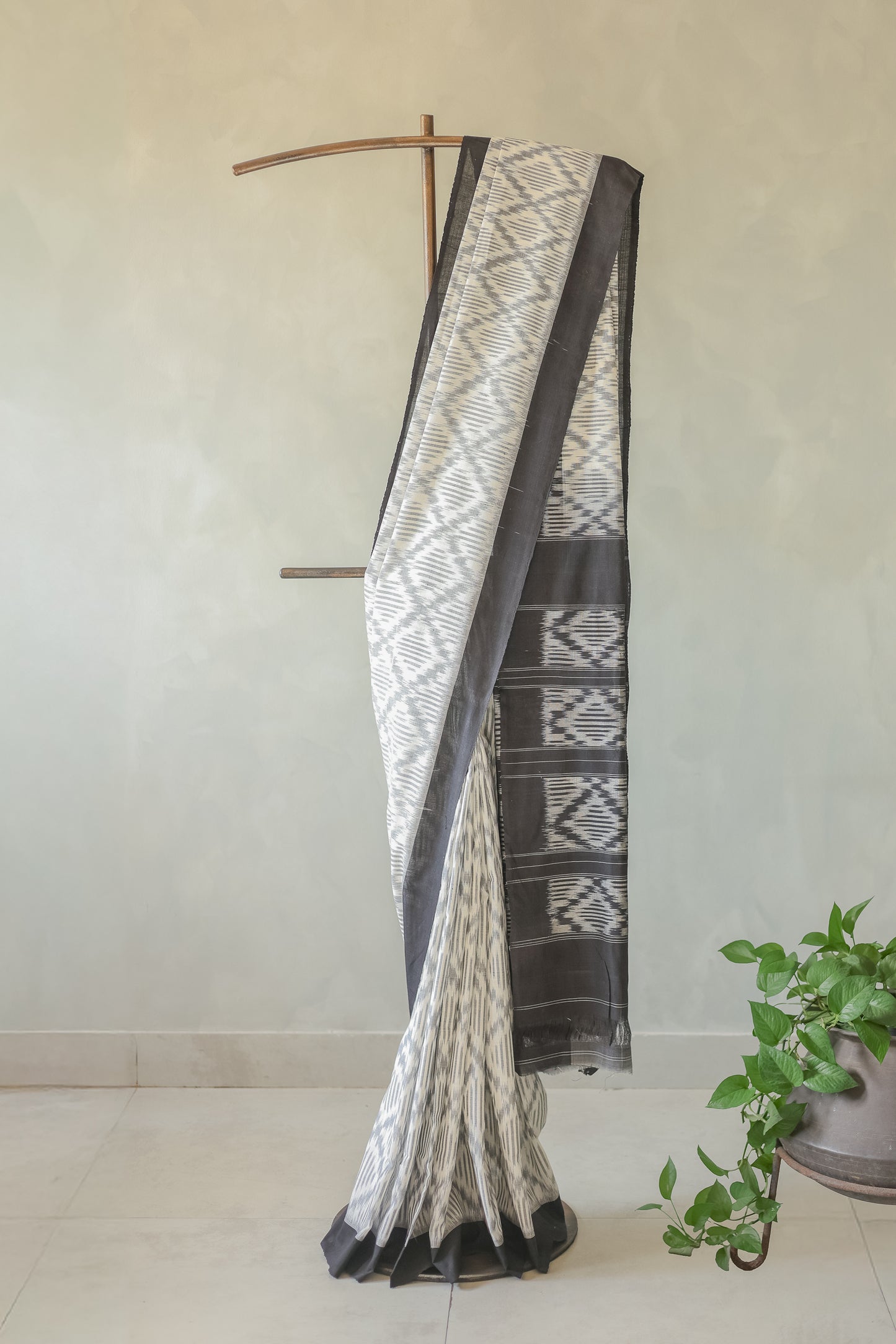 Off White Ikat Cotton with Small Black Border Saree