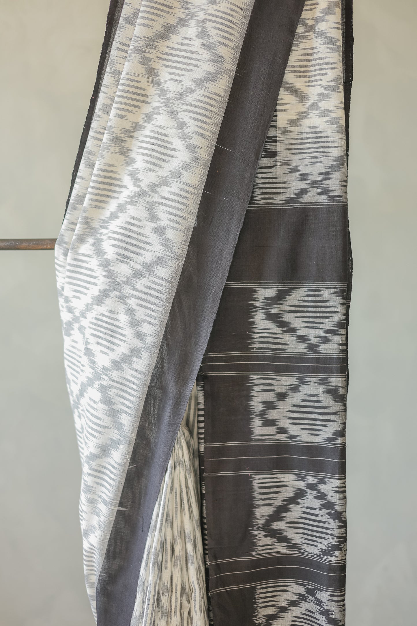 Off White Ikat Cotton with Small Black Border Saree