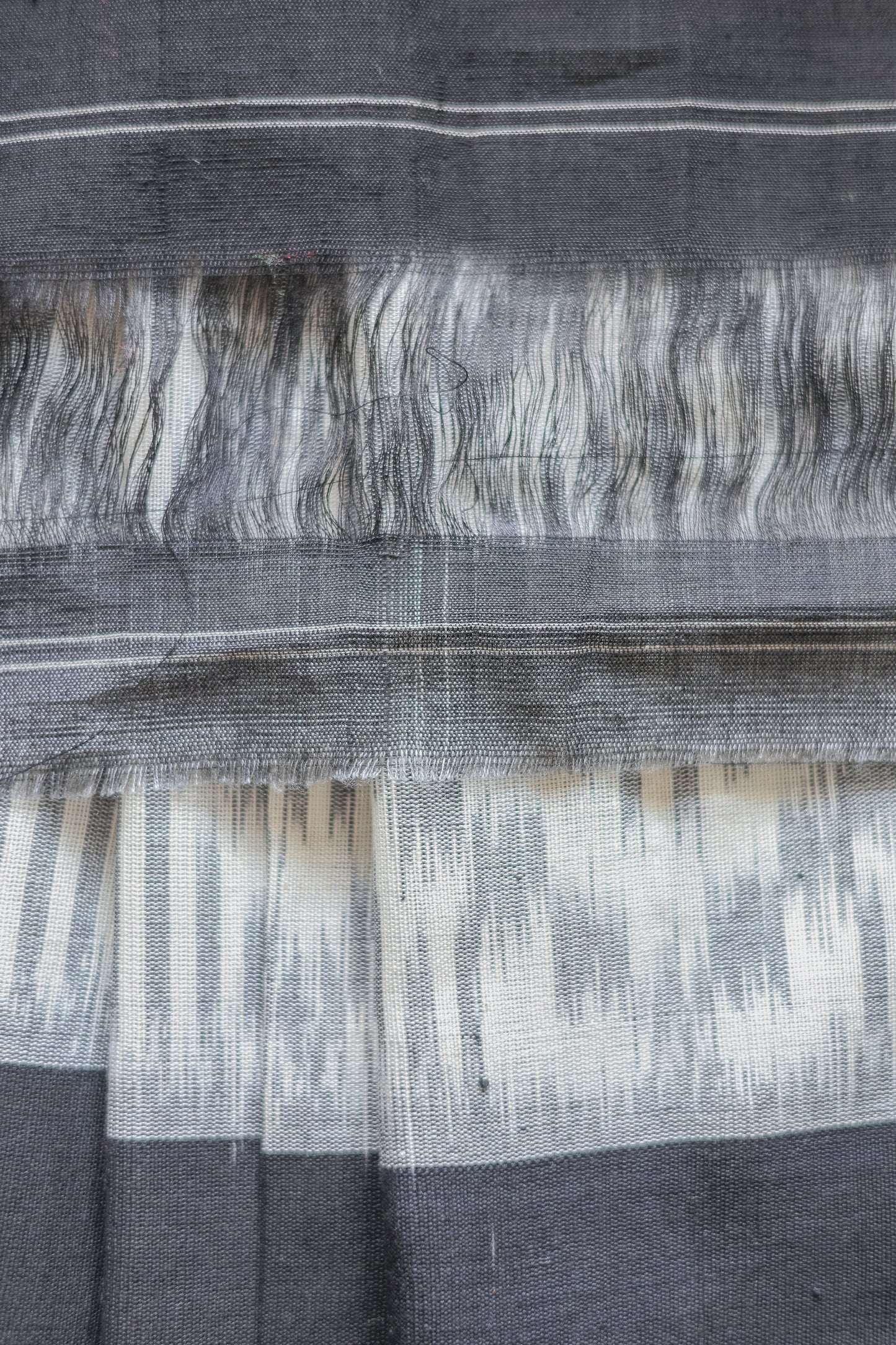 Off White Ikat Cotton with Small Black Border Saree