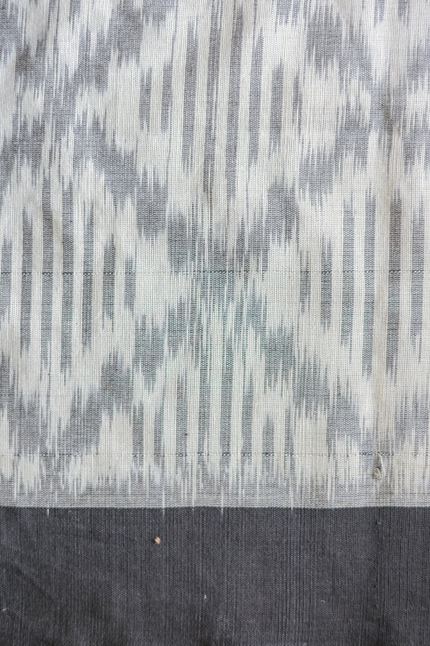 Off White Ikat Cotton with Small Black Border Saree