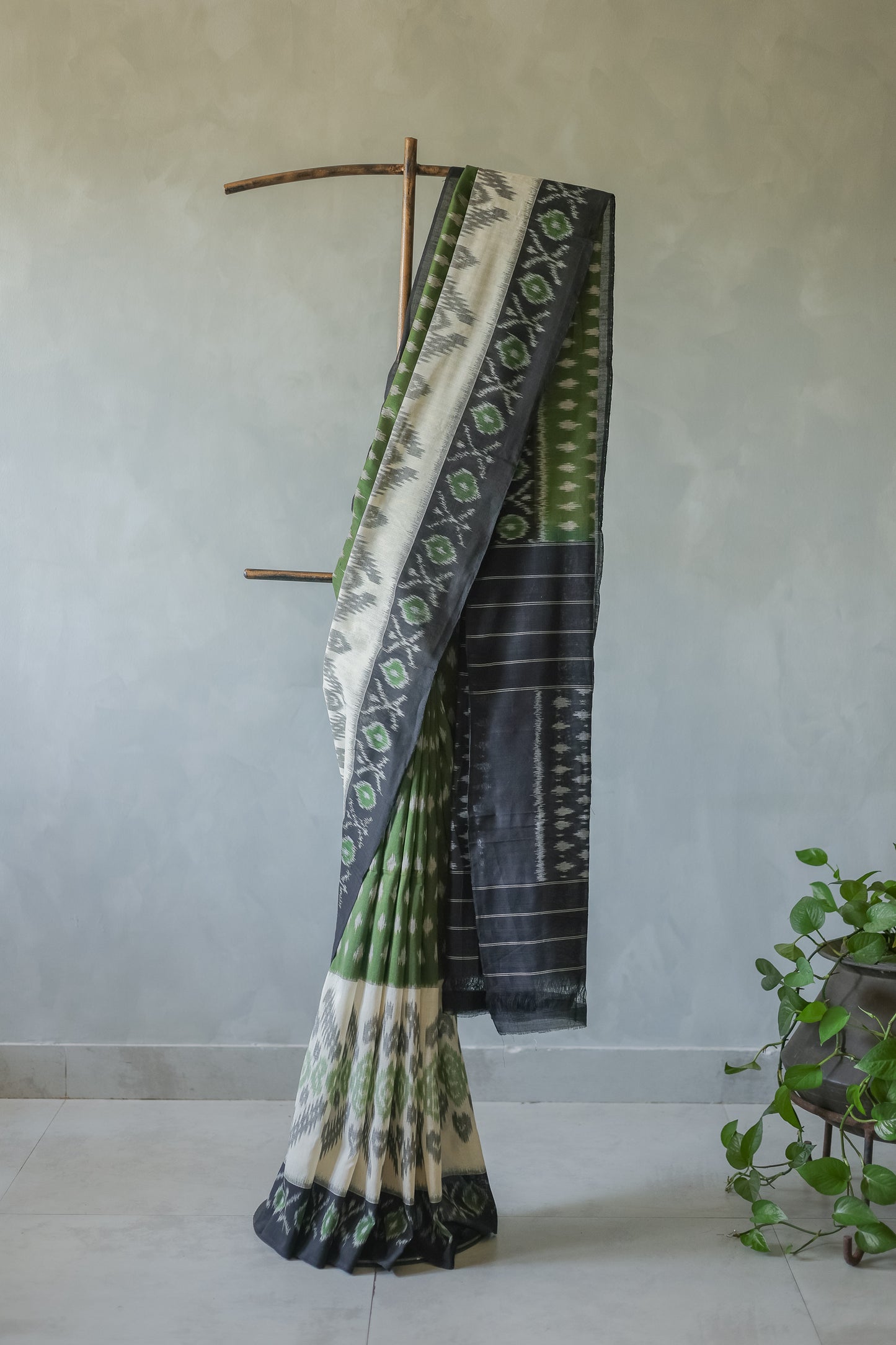 Off White Ikat Cotton with Black Border Saree