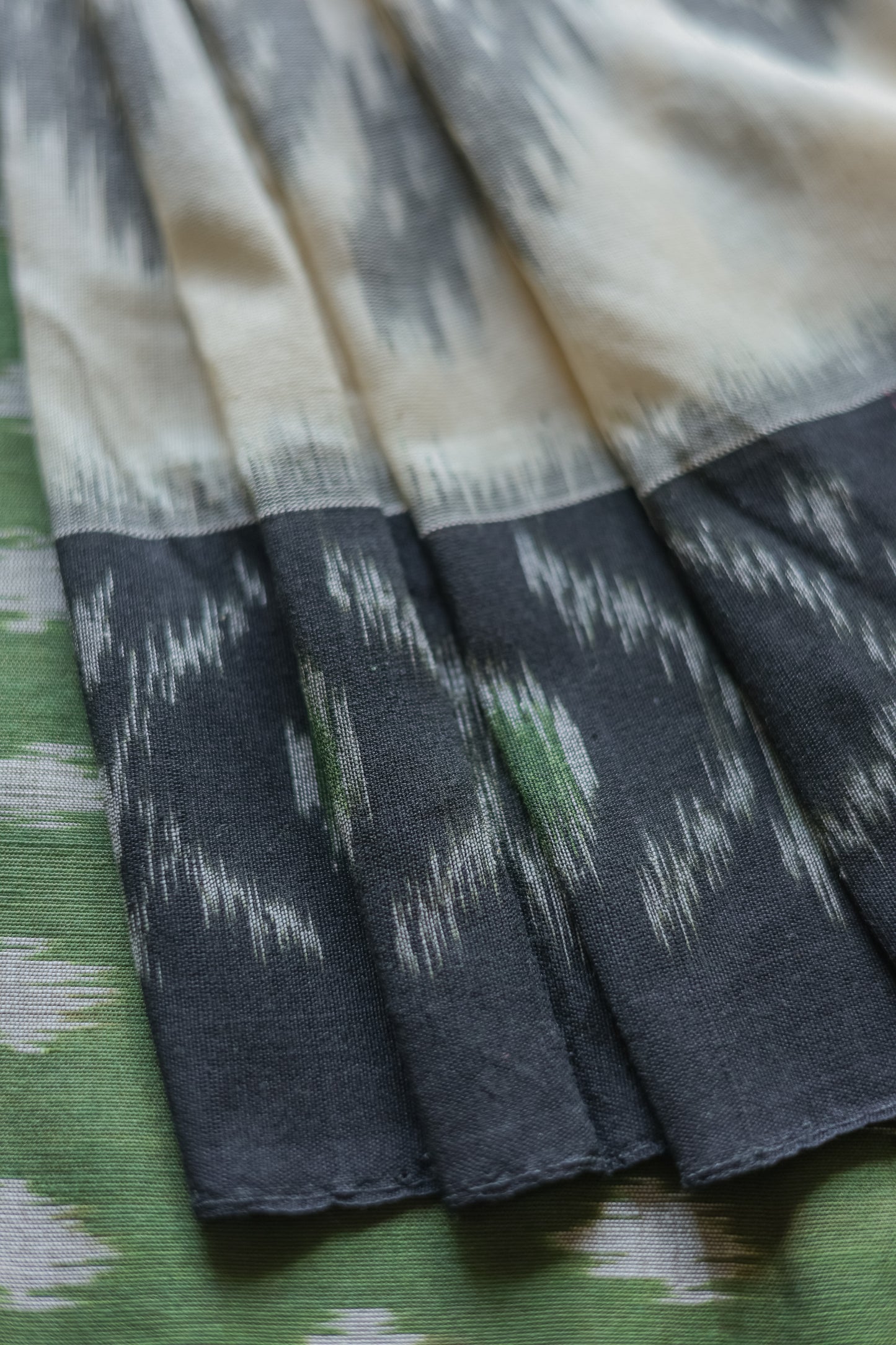 Off White Ikat Cotton with Black Border Saree